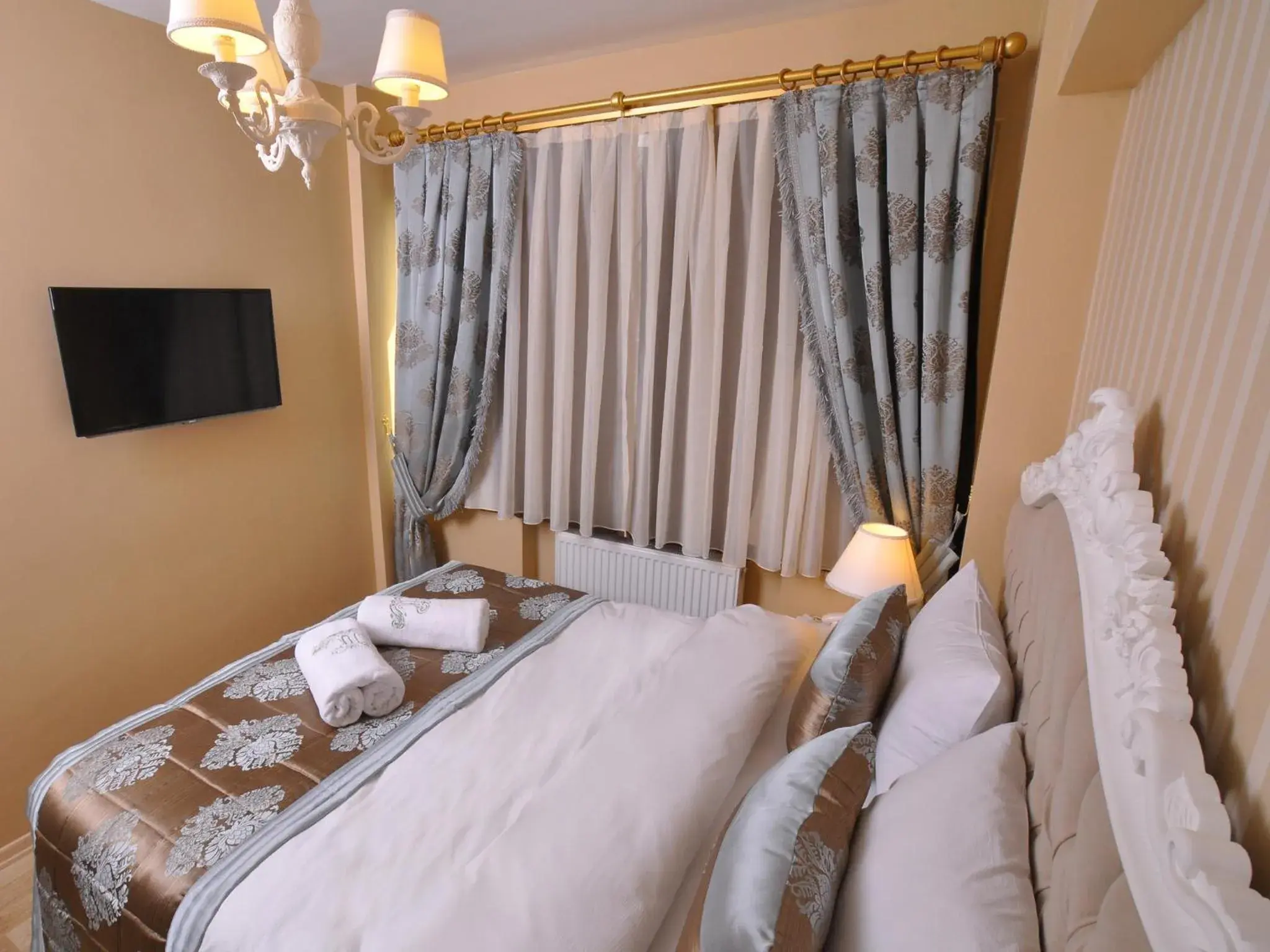 Bed in Divani Ali Hotel