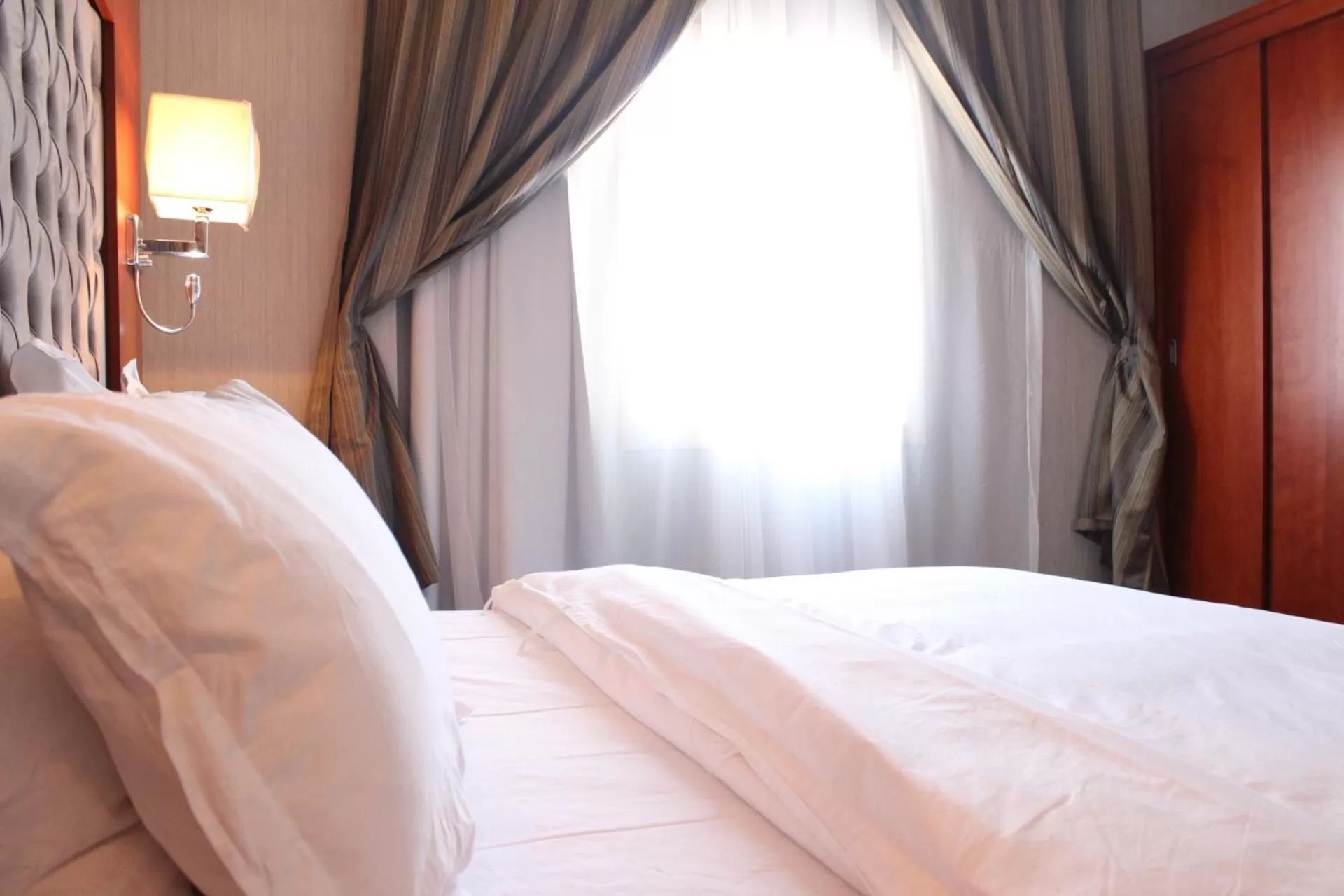 Bed in شاطيء الحياة للأجنحة الفندقية shaty alhayat