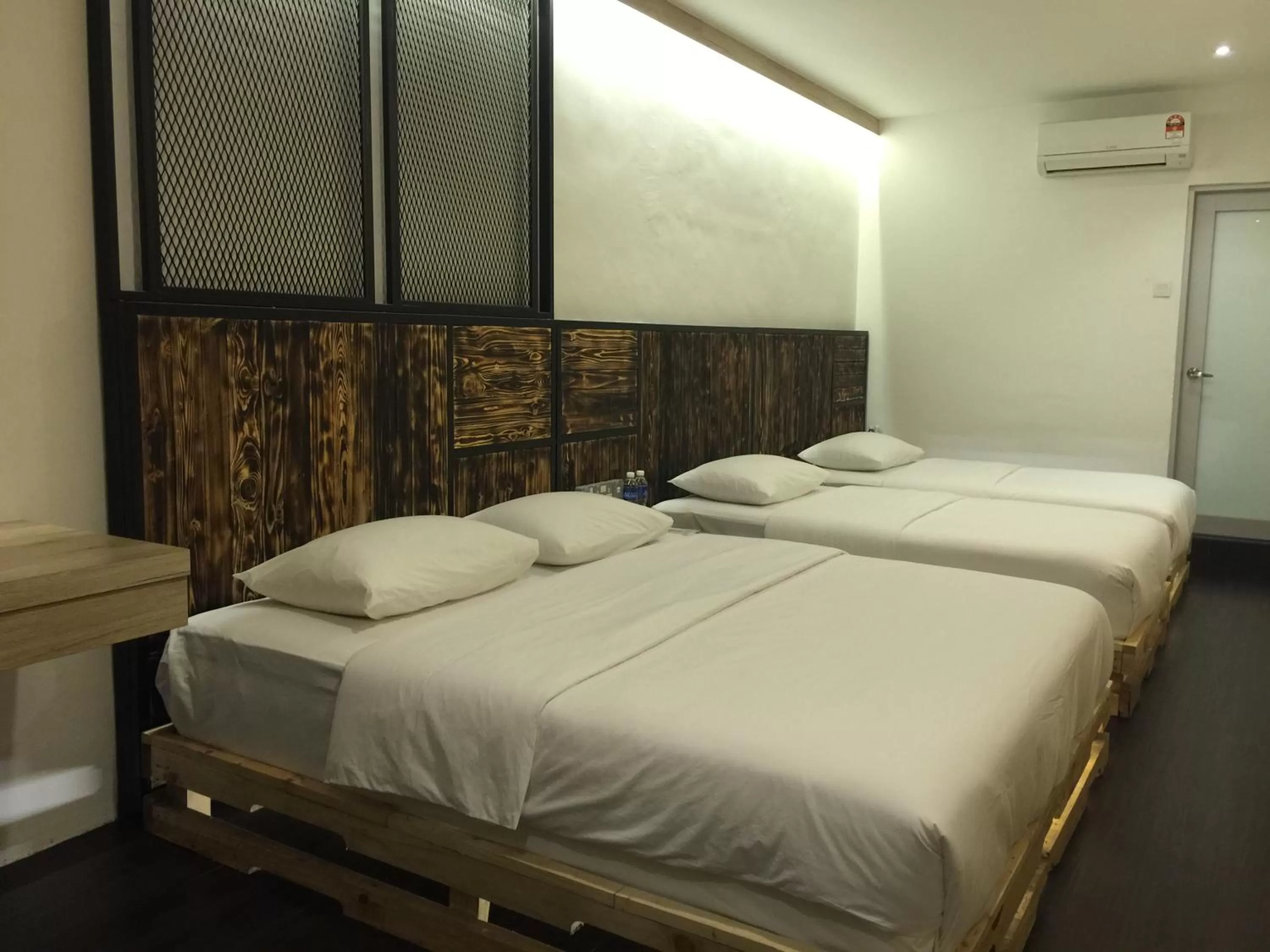 Bed in The Oikos Hotel