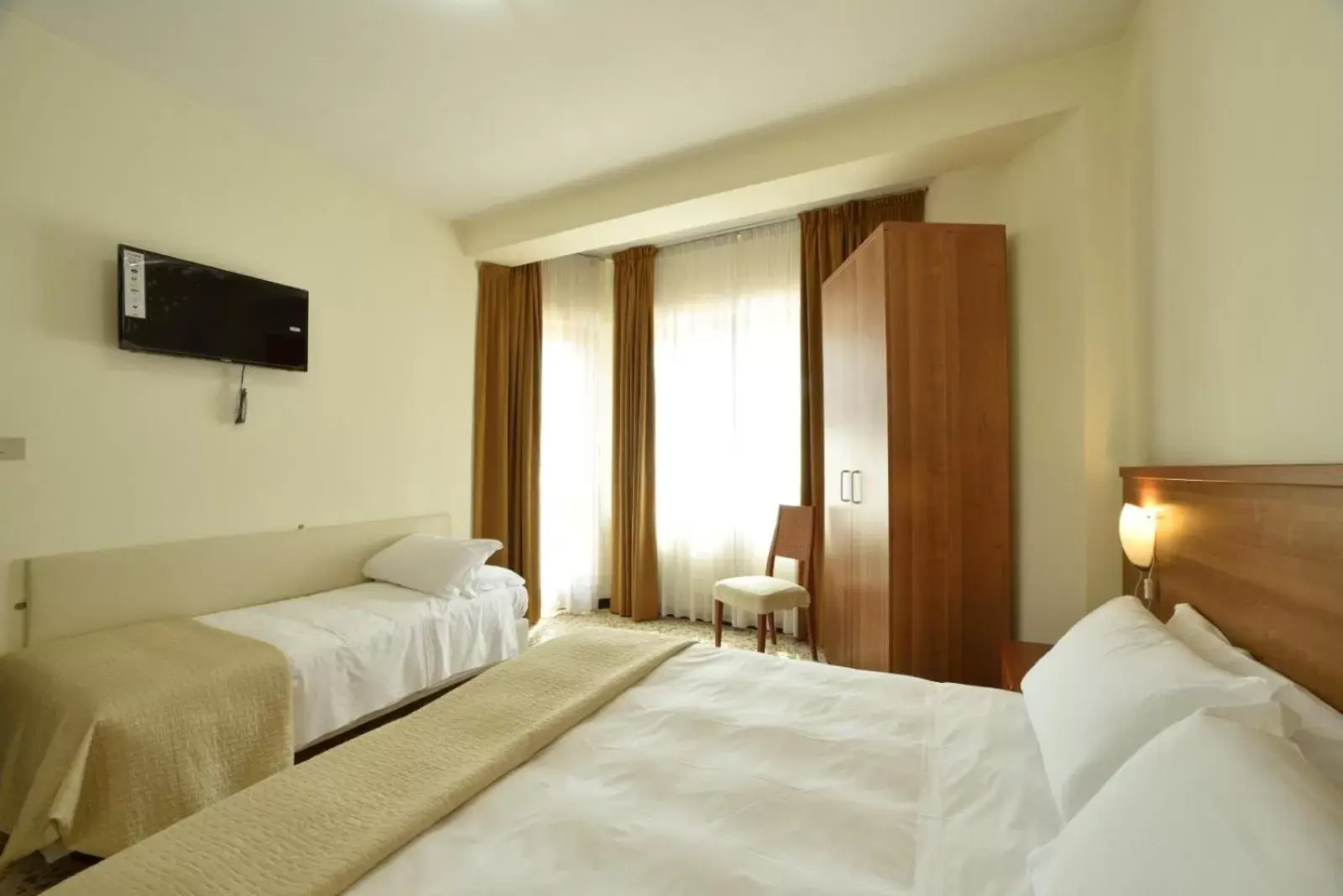 Photo of the whole room, Bed in Hotel Diano Marina Mhotelsgroup