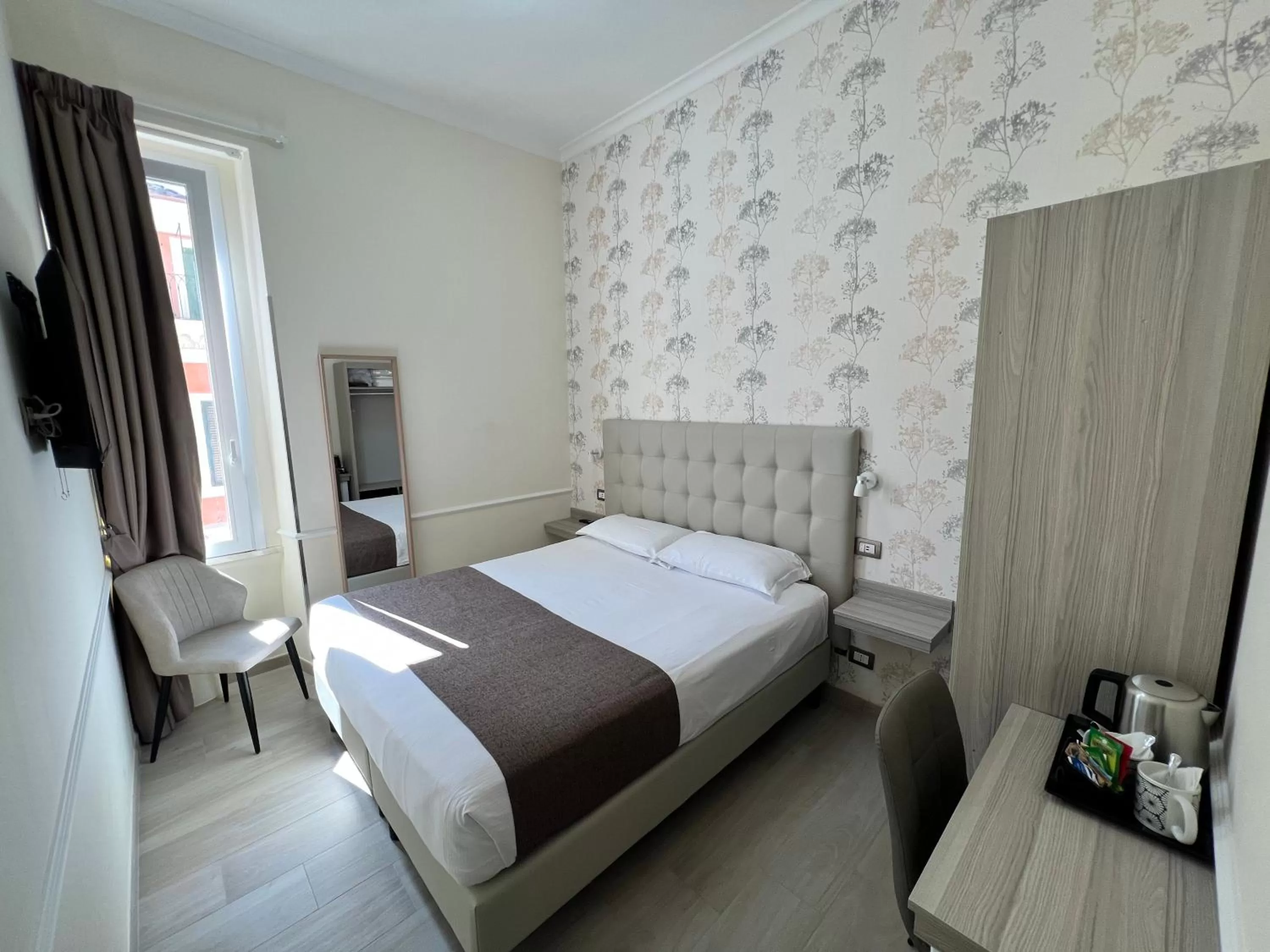 Bed in Hotel Le Petit