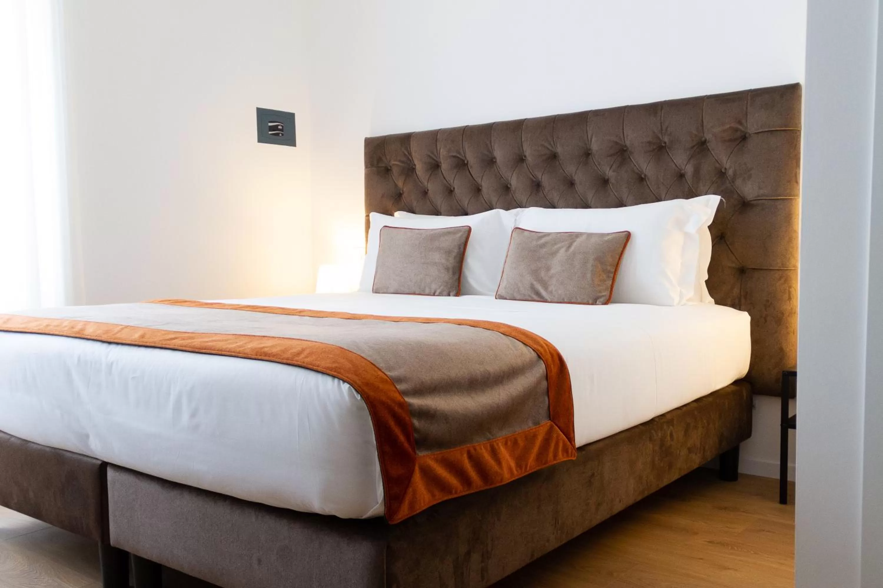 Bed in Michelangelo Vatican Rooms