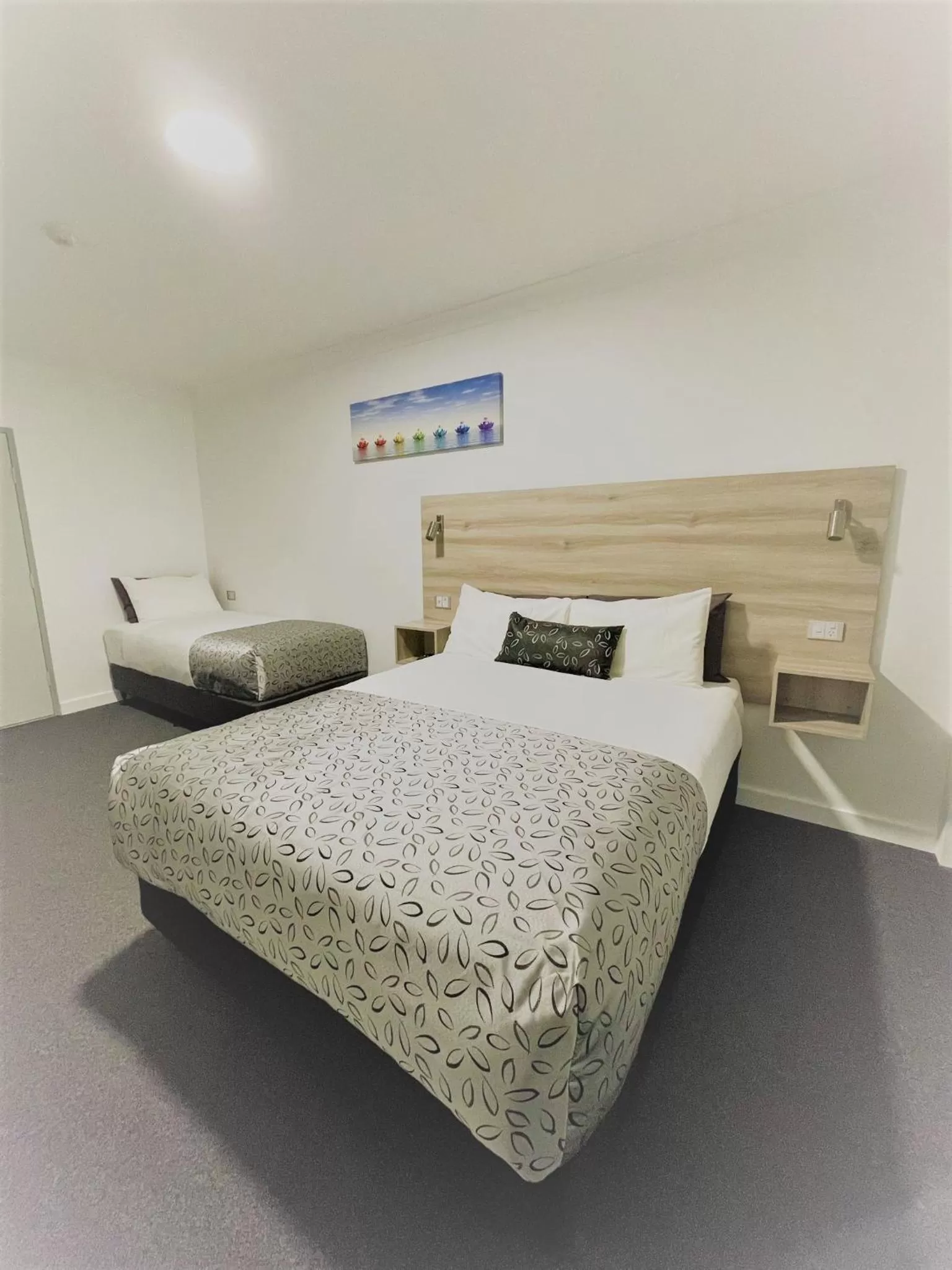 Bed in Childers Oasis Motel