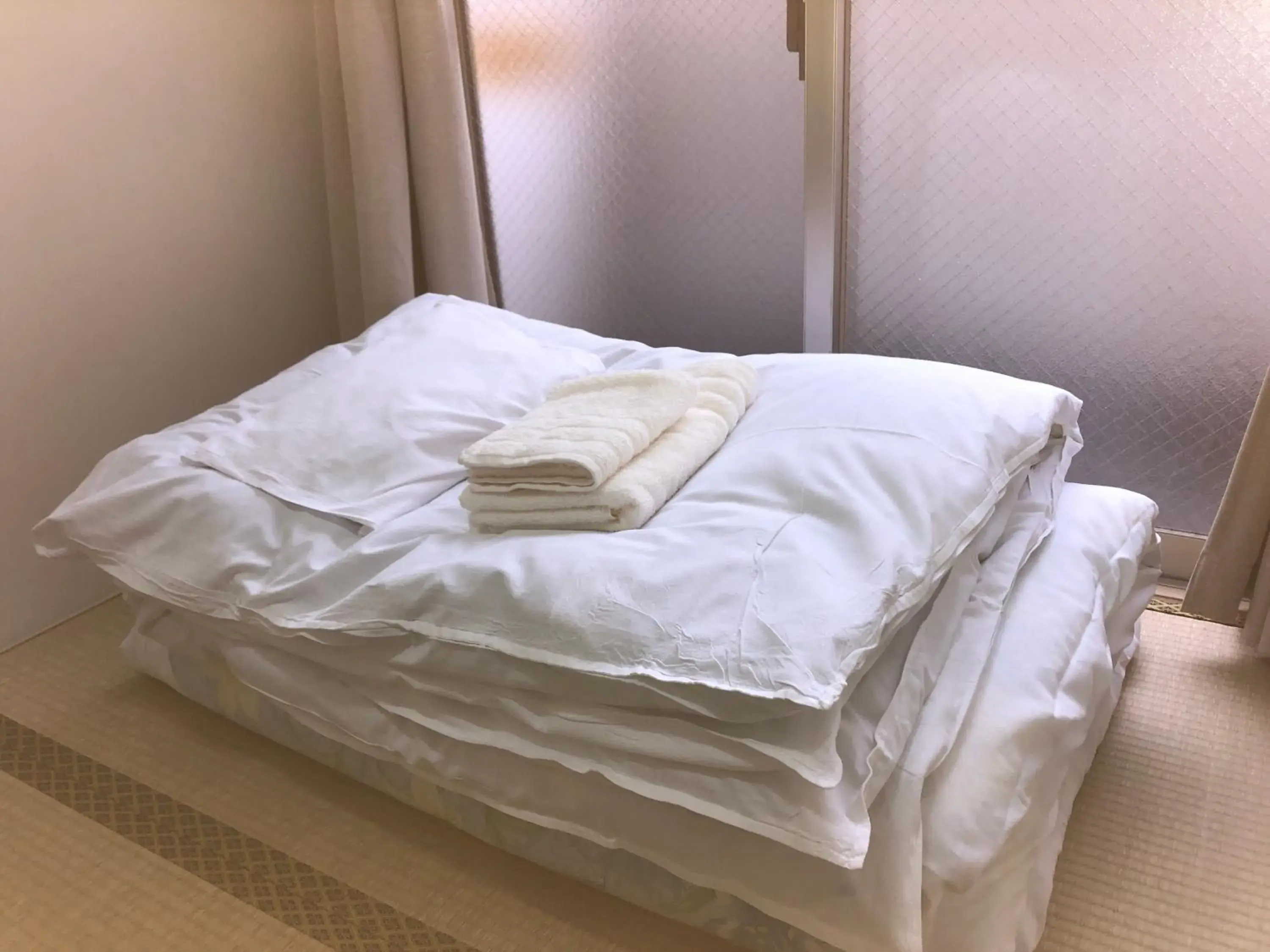 Bed in Hotel Mirai