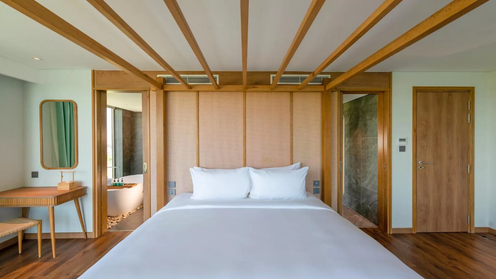 Bed in Bellerive Hoi An Resort and Spa