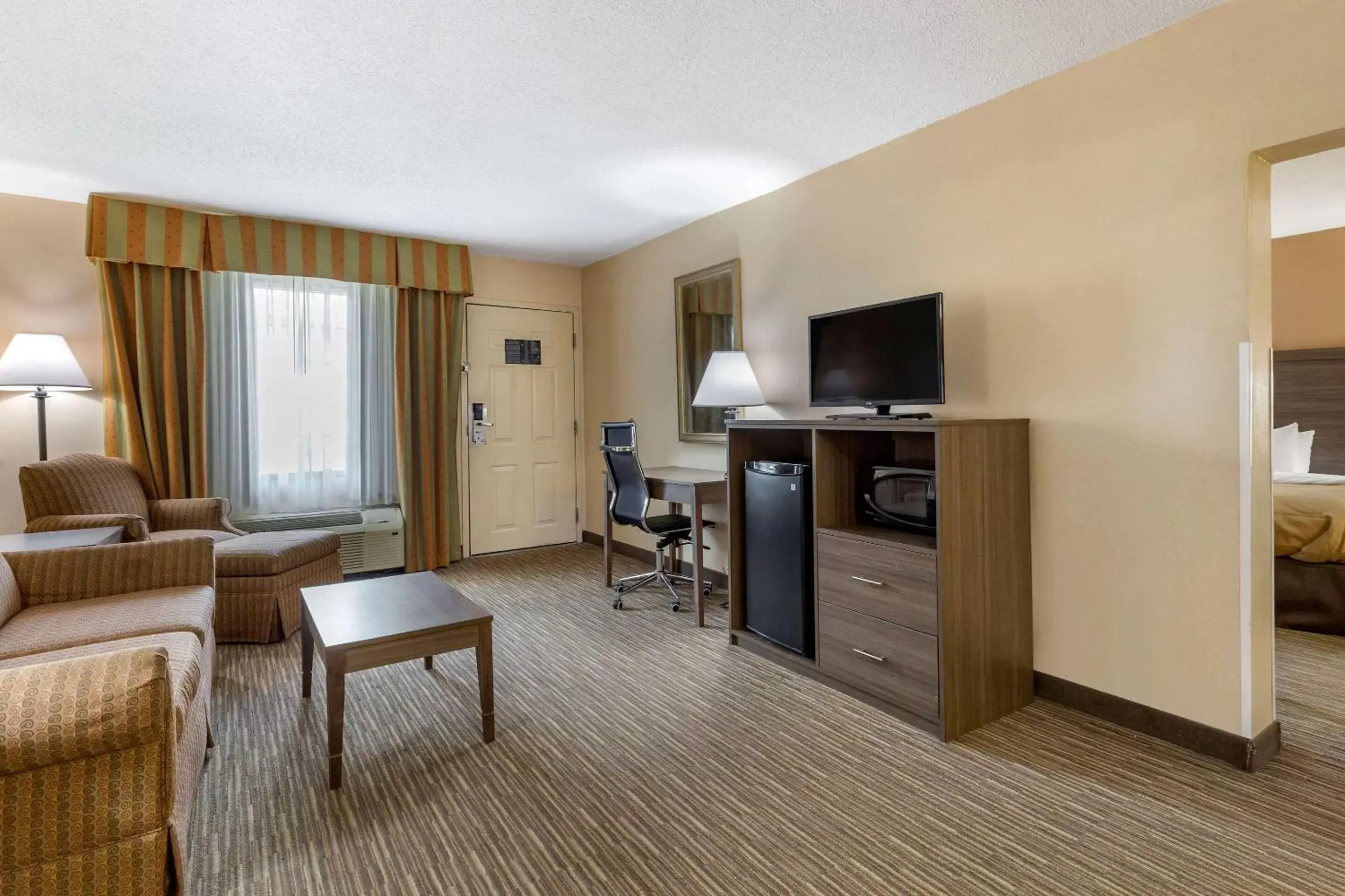 Bedroom, Seating Area in Quality Inn & Suites Hanes Mall