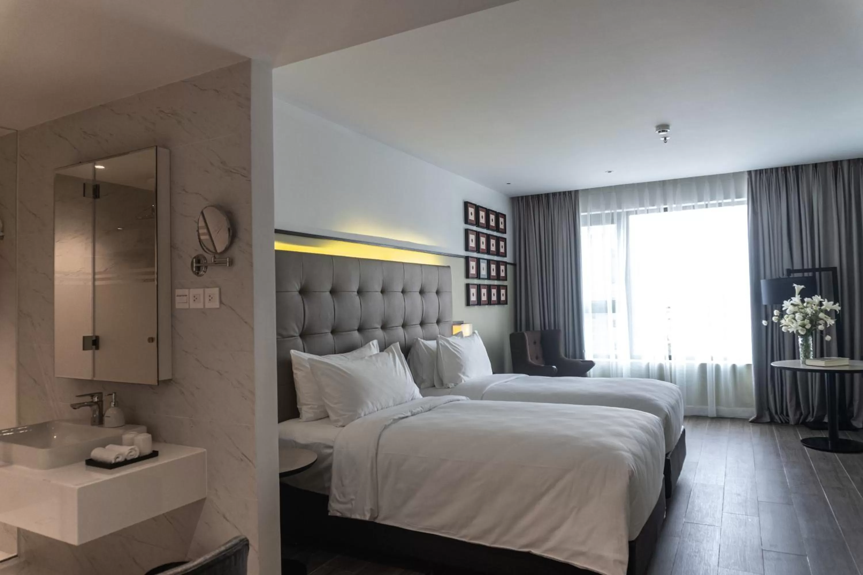 Photo of the whole room, Bed in M Village Hotel Tôn Thất Đạm