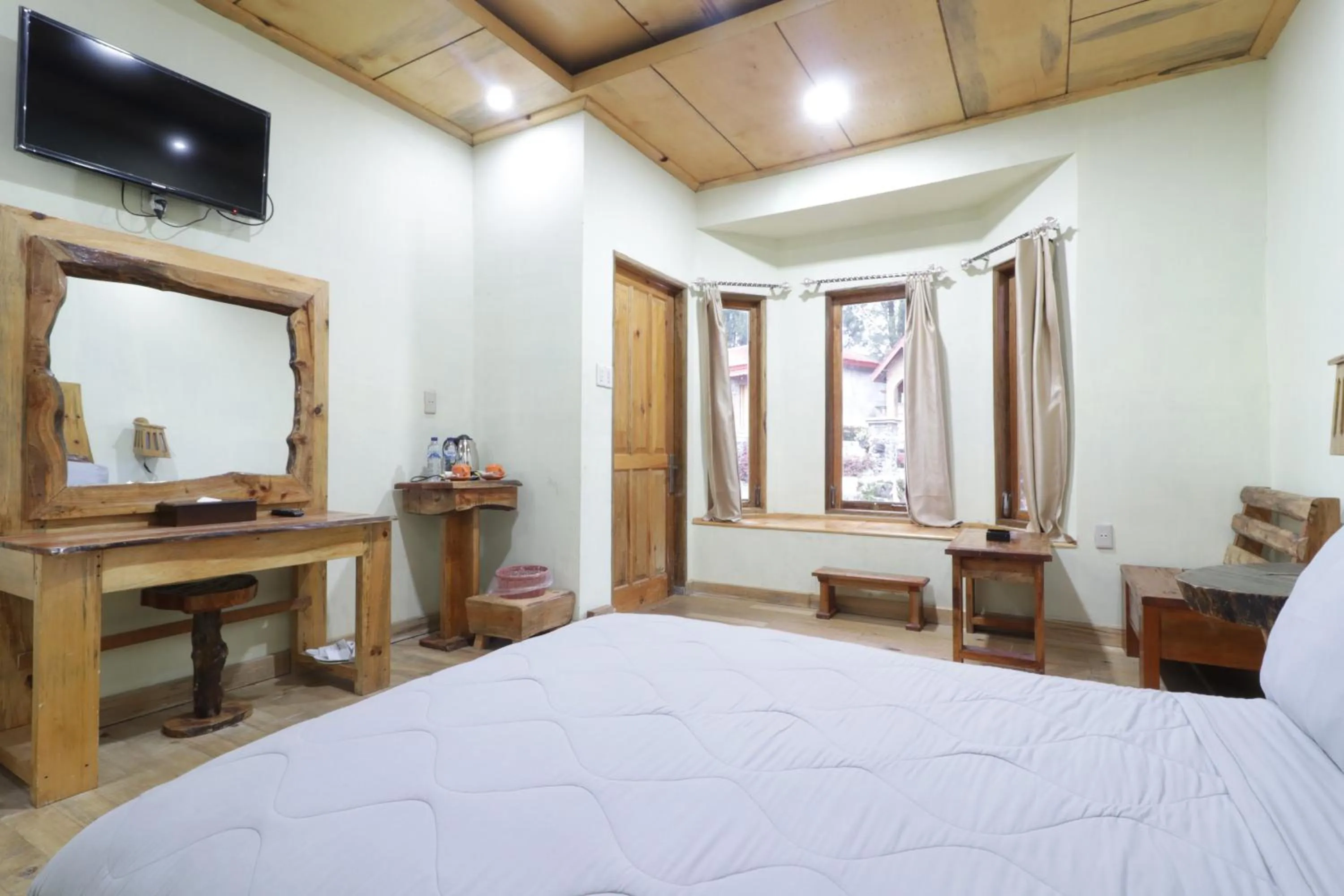 Bed in Alloyna Country Cottage Brastagi
