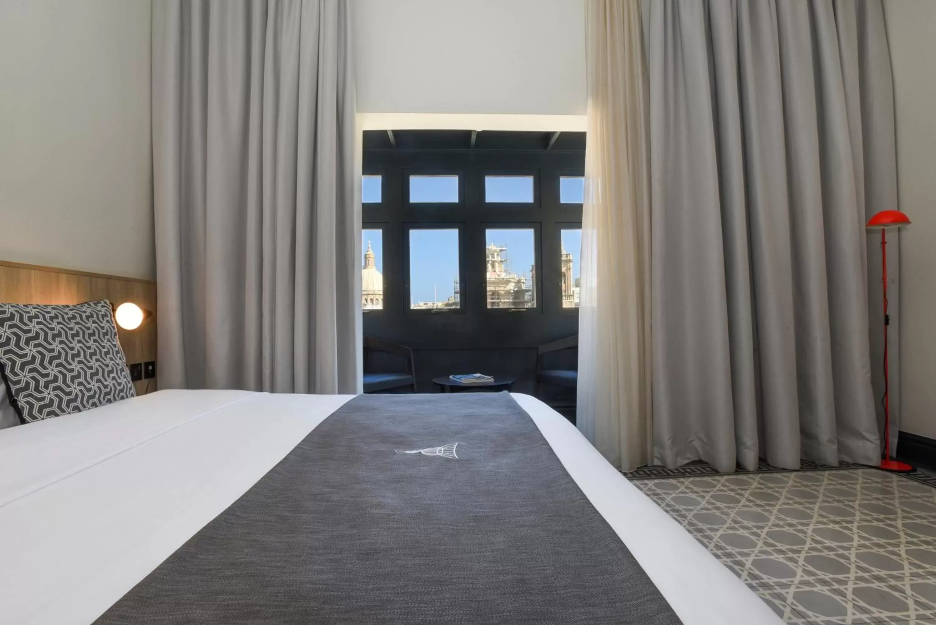 Bed in La Falconeria Hotel