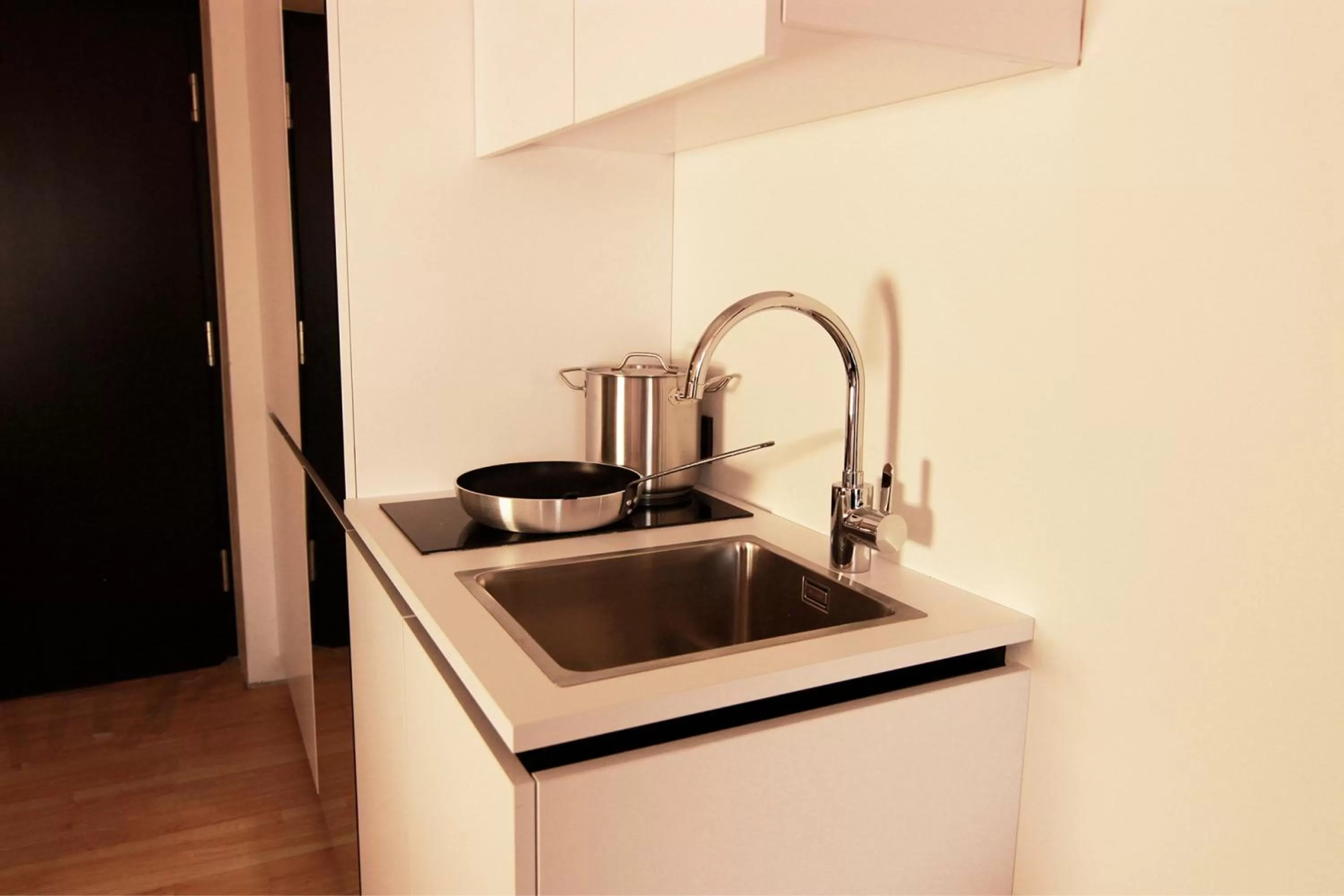 Kitchen or kitchenette in LH Hotel by WMM Hotels