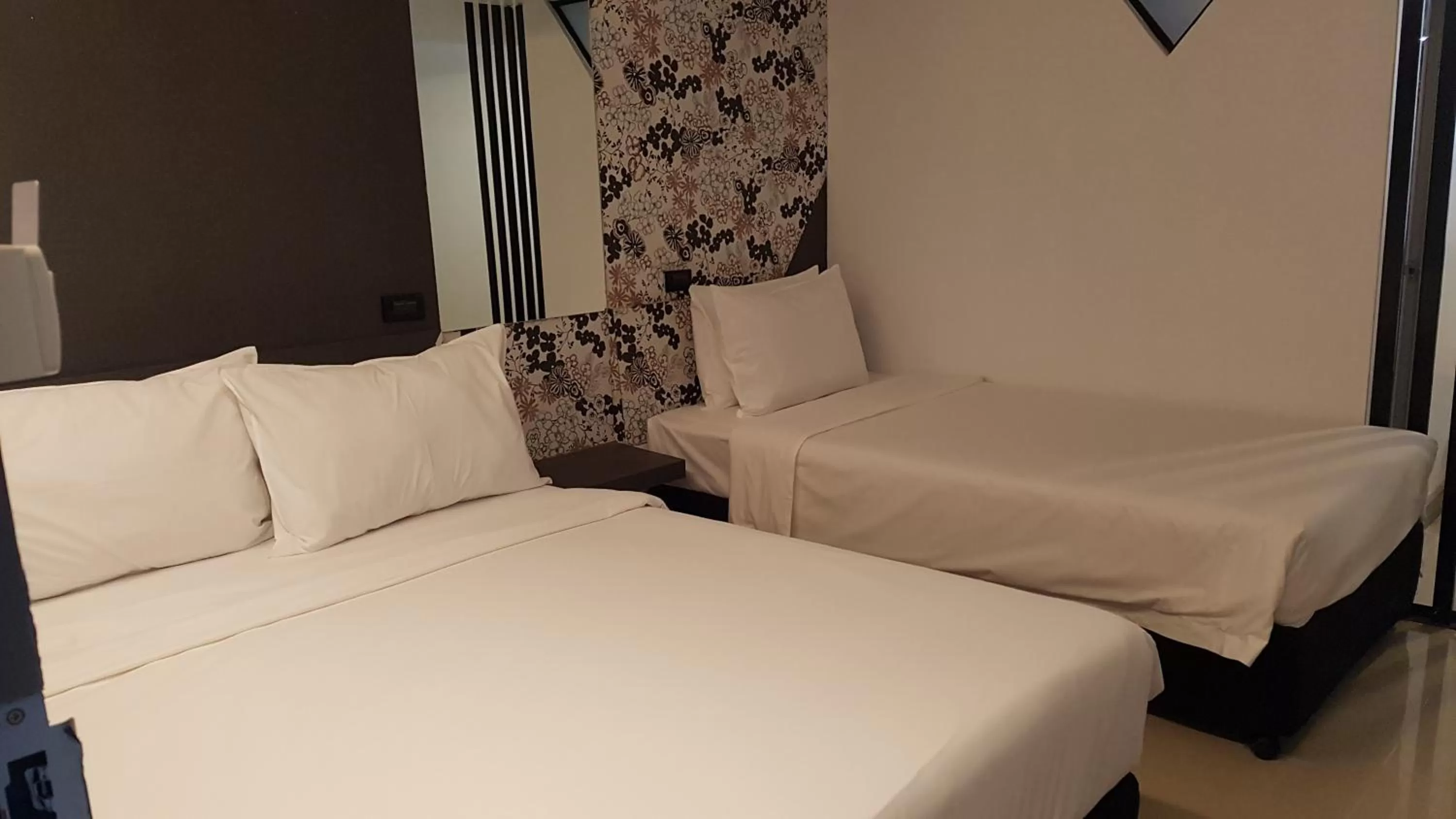 Bed in Loyy Hotel