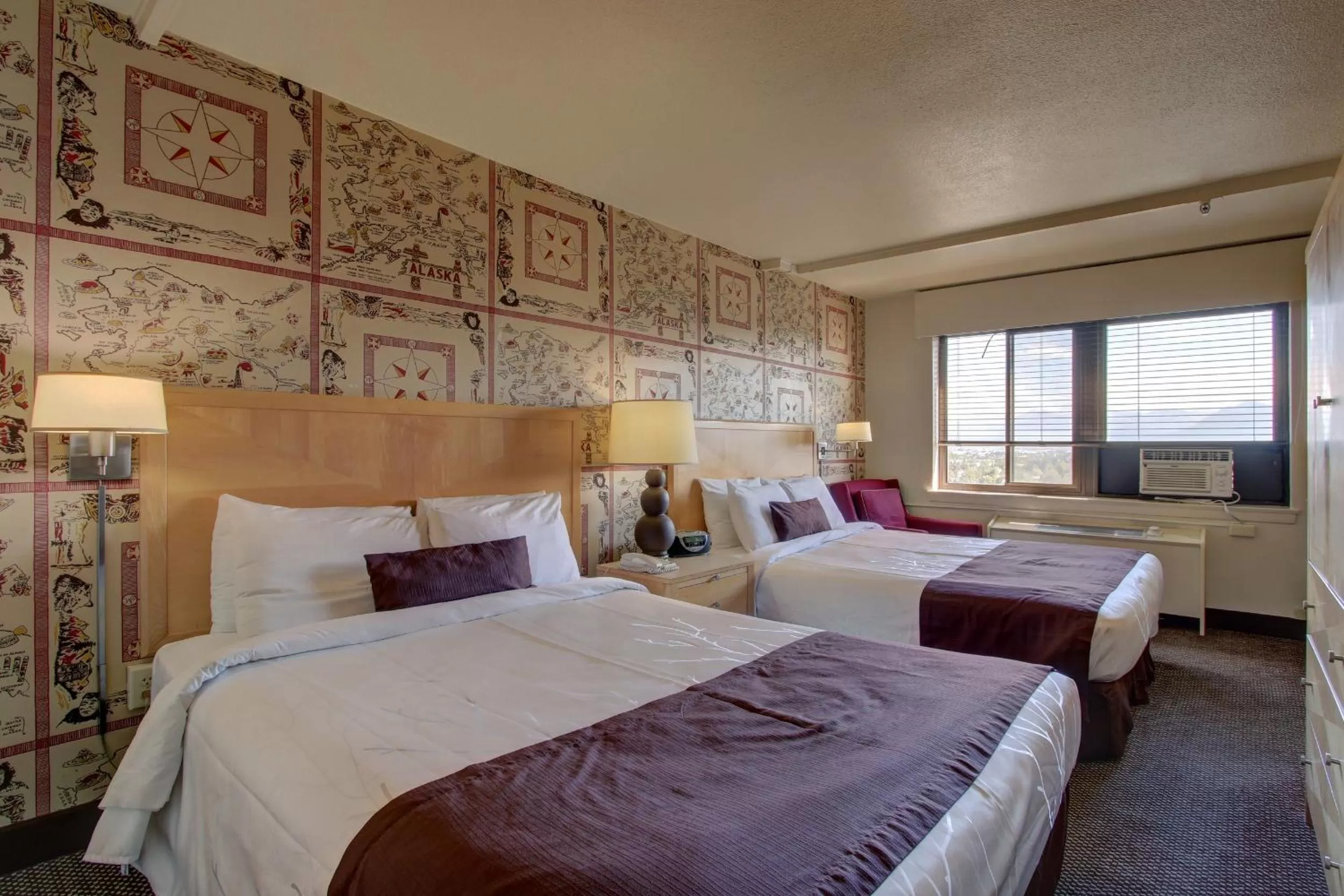 Bed in Inlet Tower Hotel & Suites