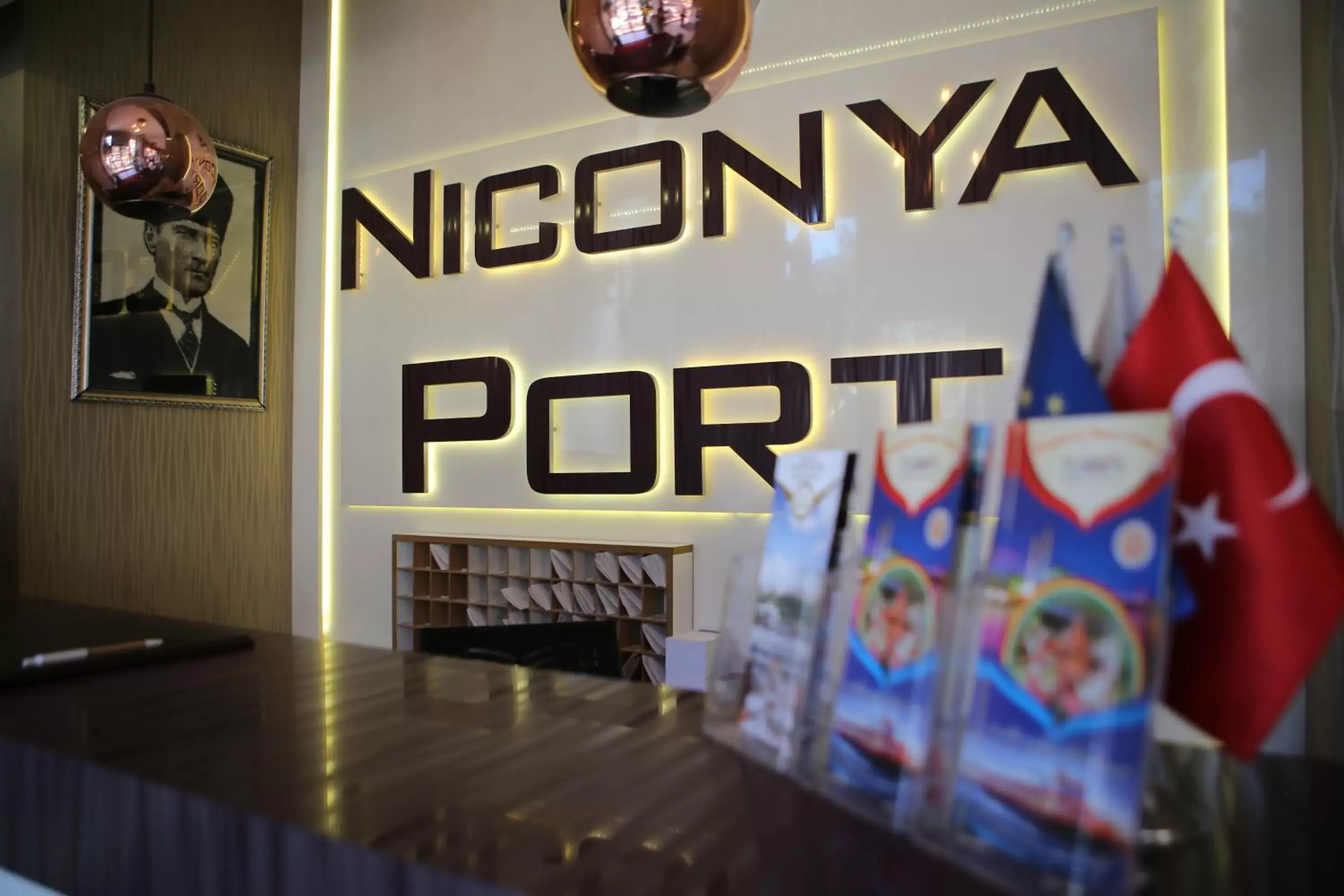 Property logo or sign in Niconya Port Suite&Hotel