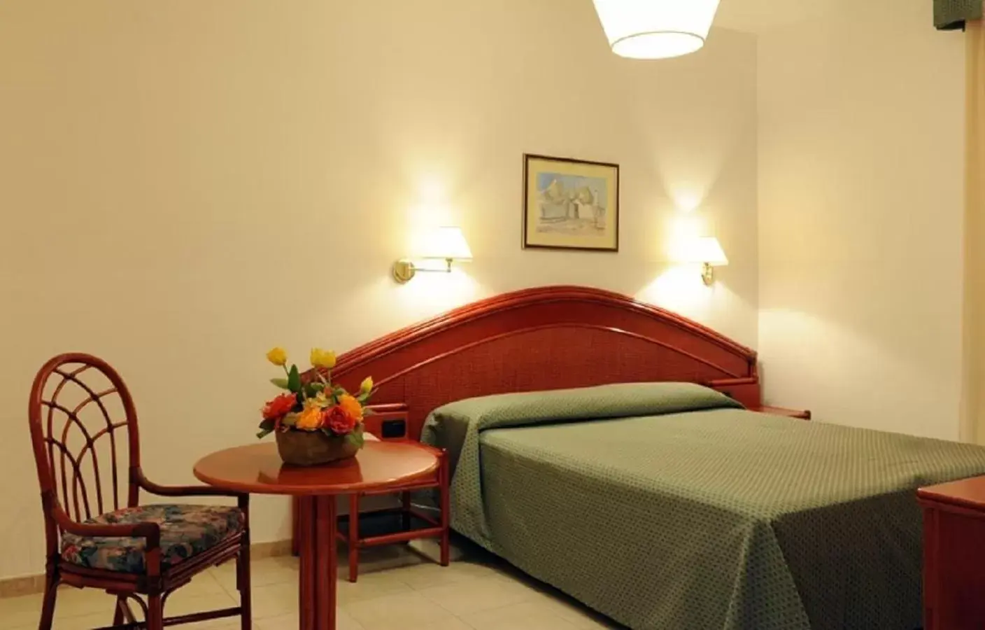Bedroom in Hotel Villa Rosa