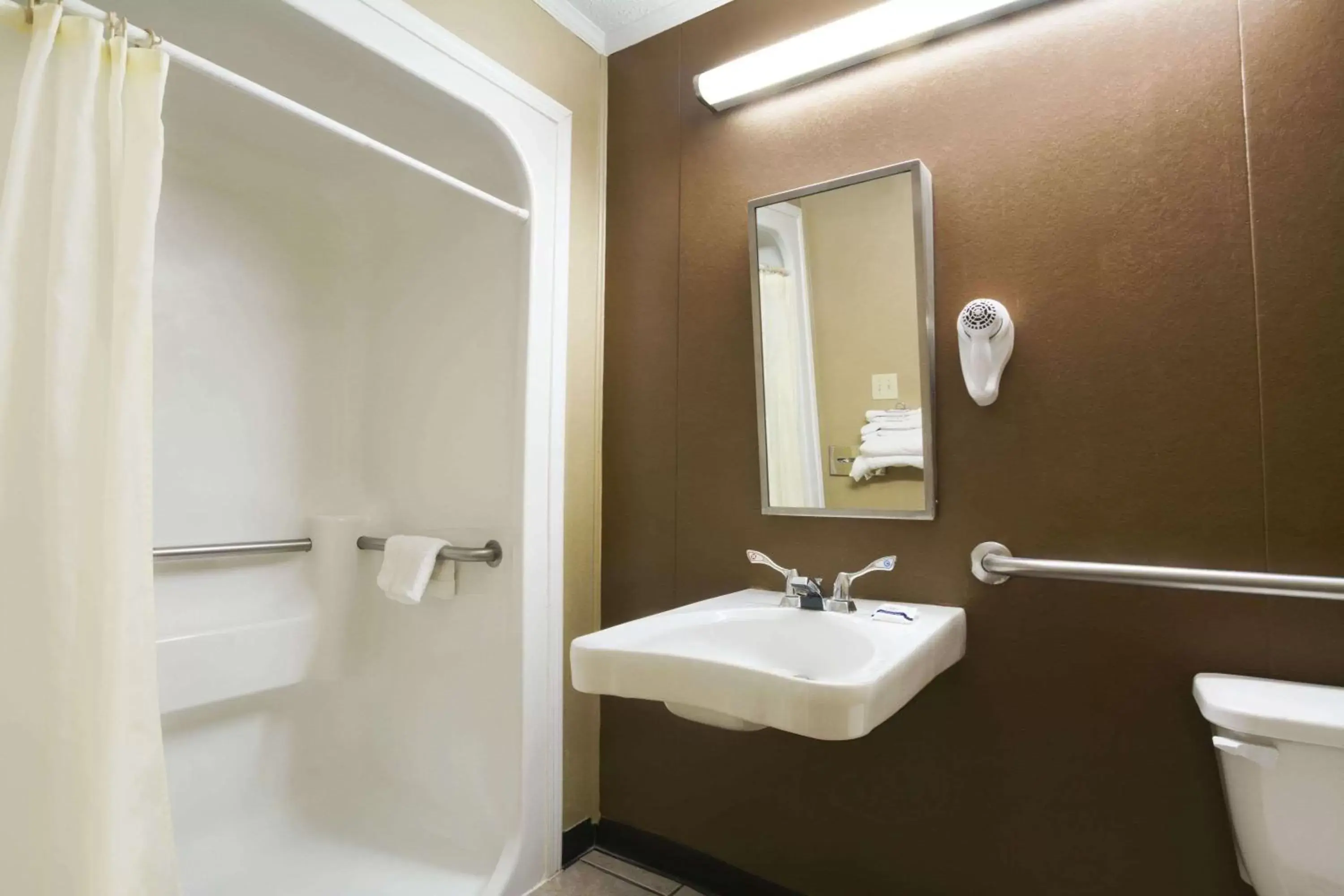 Bathroom in Microtel Inn & Suites by Wyndham Columbia Fort Jackson N