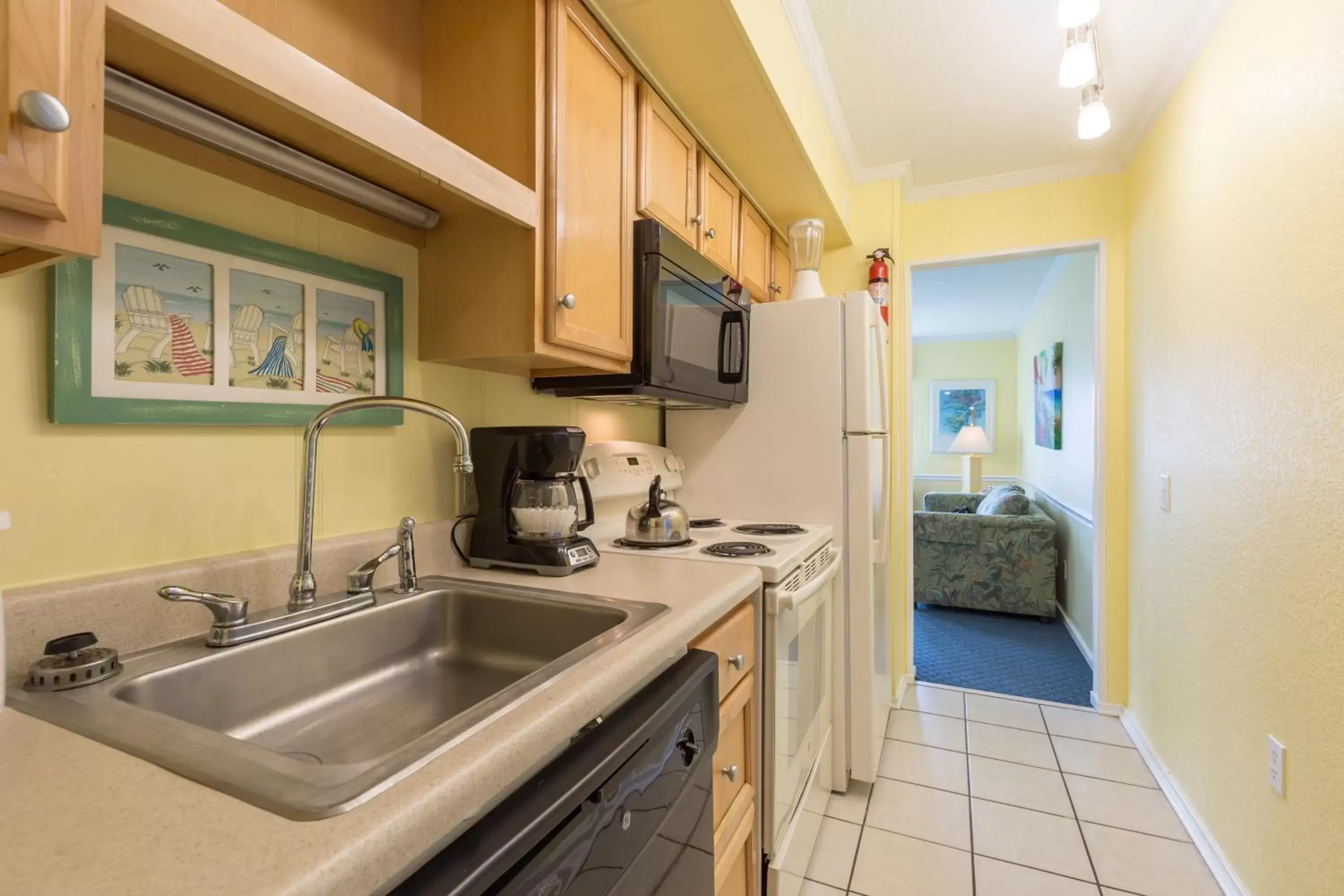 Kitchen or kitchenette, Kitchen/Kitchenette in A Place at the Beach by Capital Vacations