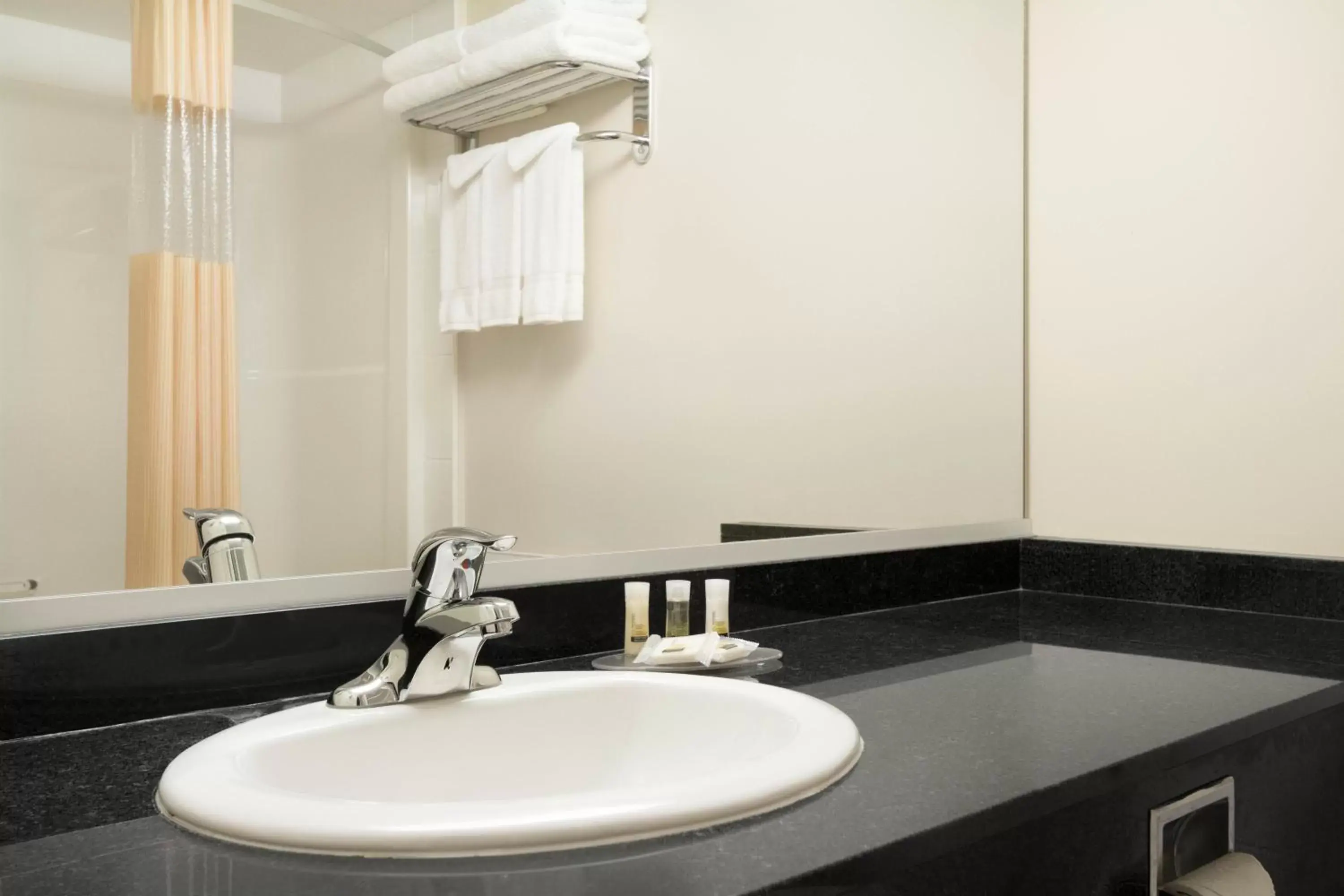 Bathroom in Days Inn & Suites by Wyndham Langley