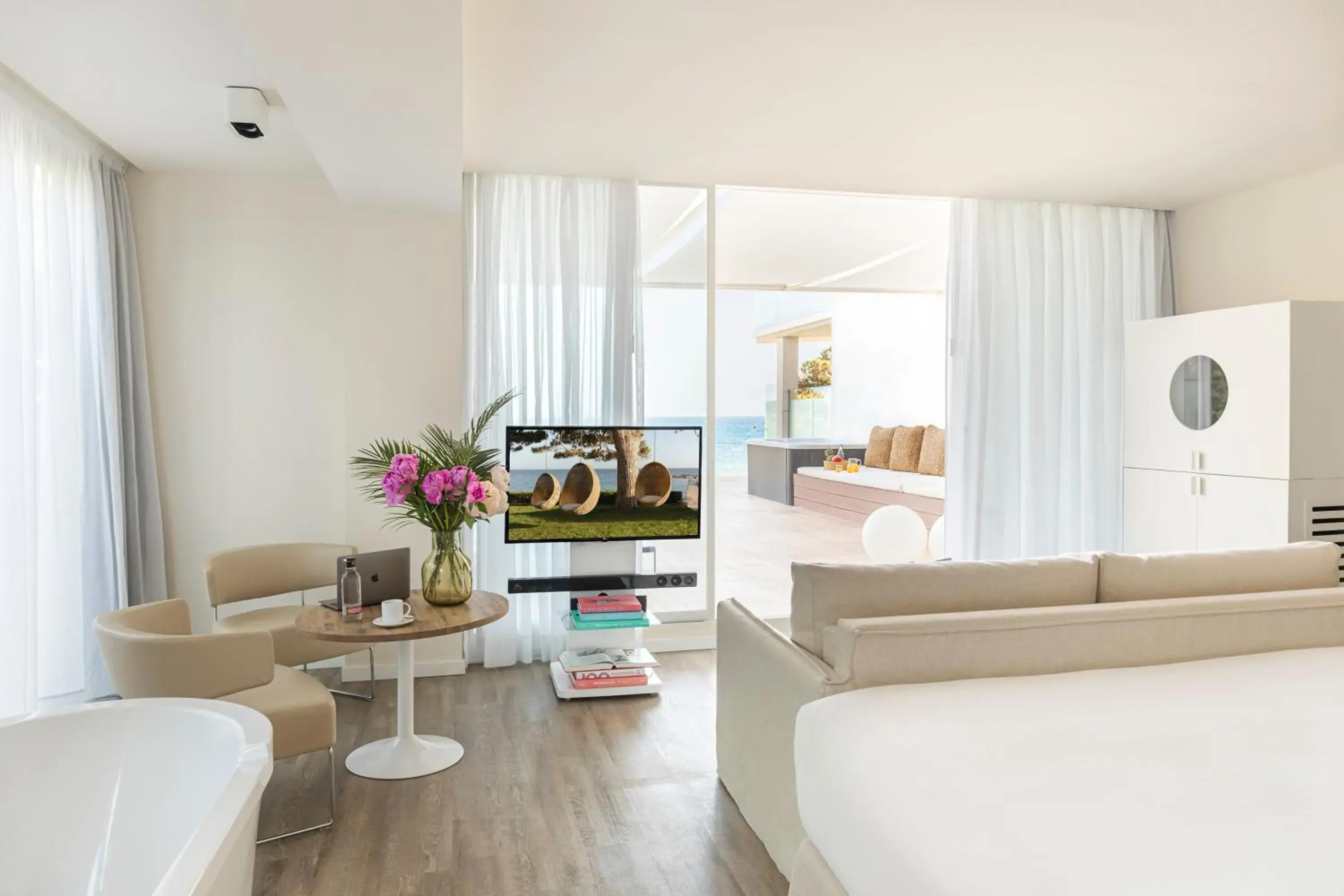 Extra ME + Junior Suite with Hot Tub Sea View and Terrace in ME Ibiza Extra ME + Junior Suite with Hot Tub Sea View and Terrace in ME Ibiza