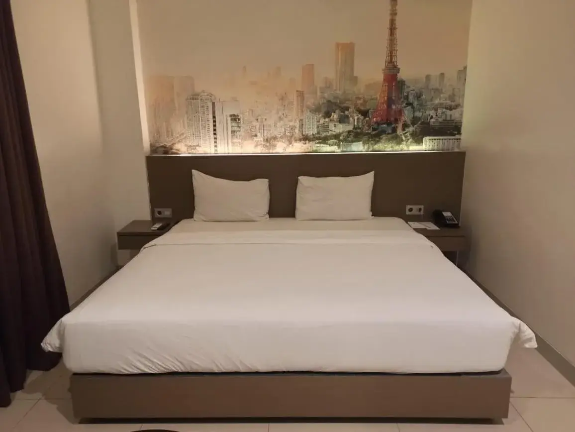 Bed in OPI INDAH Hotel