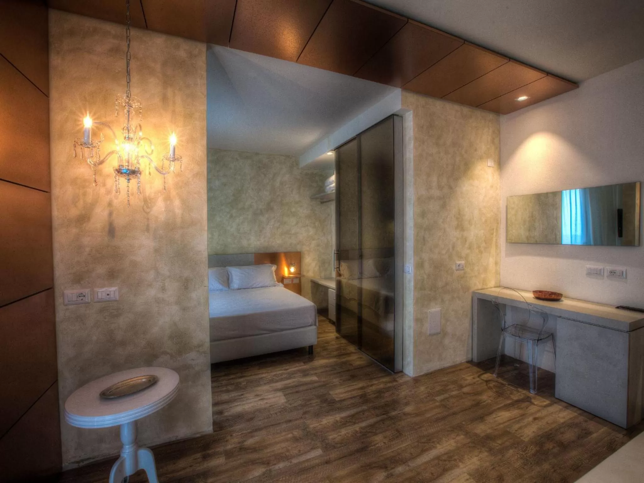 Living room, Bed in Bell Suite Hotel