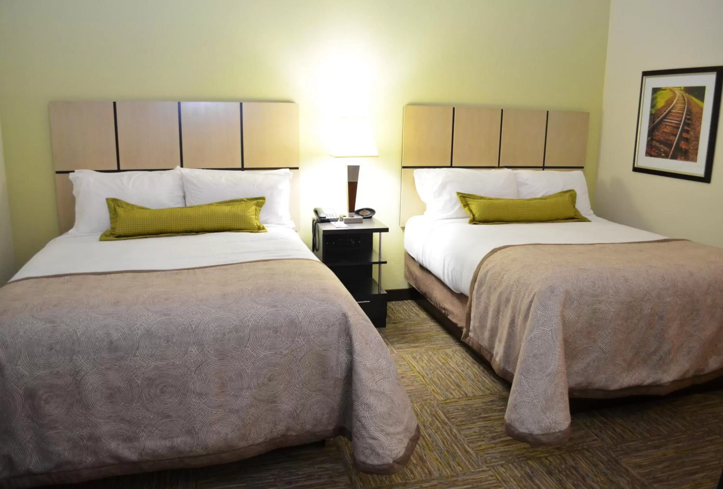 Bedroom, Bed in Candlewood Suites Greenville, an IHG Hotel