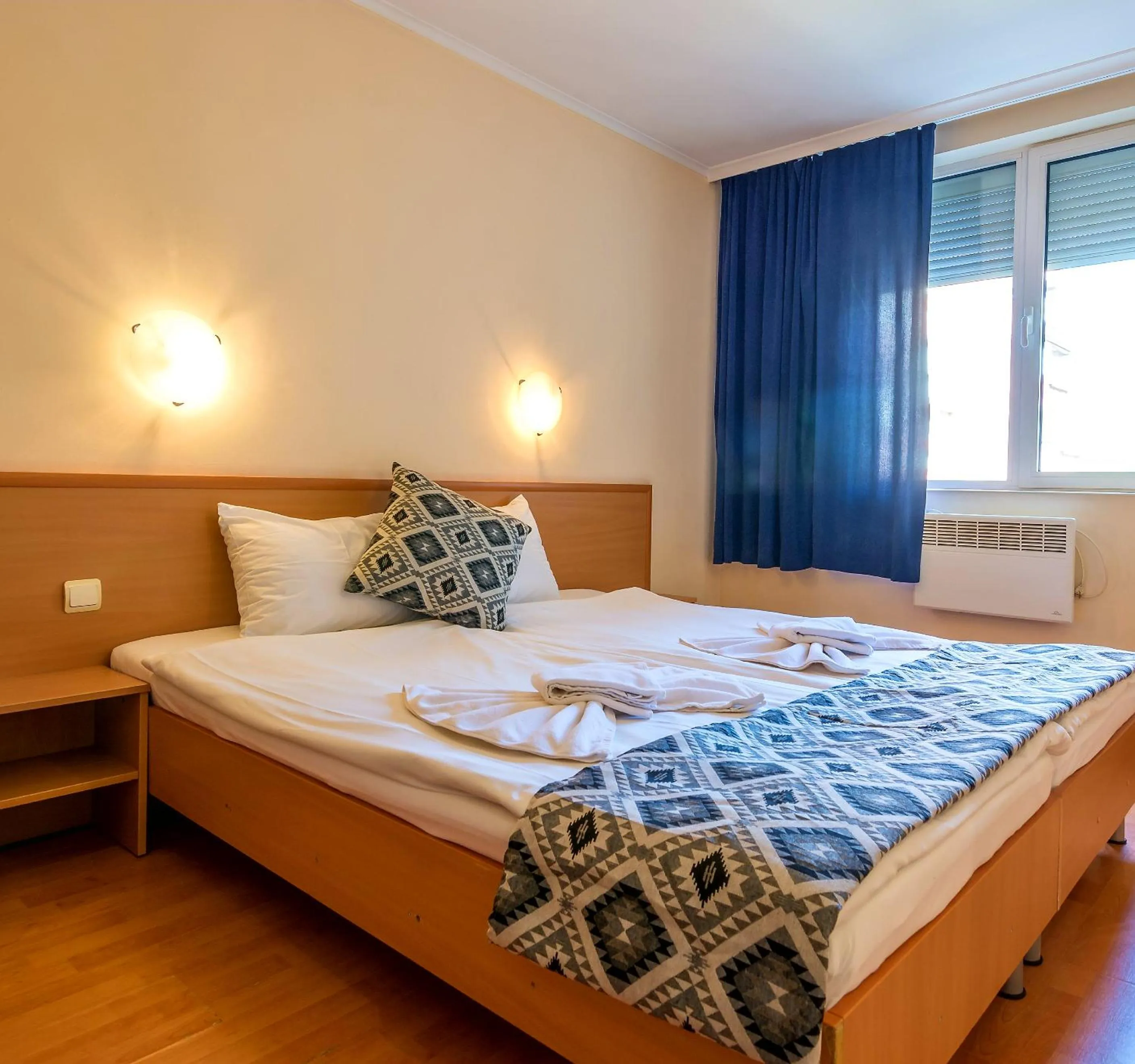 Bed in Family Hotel Dalis