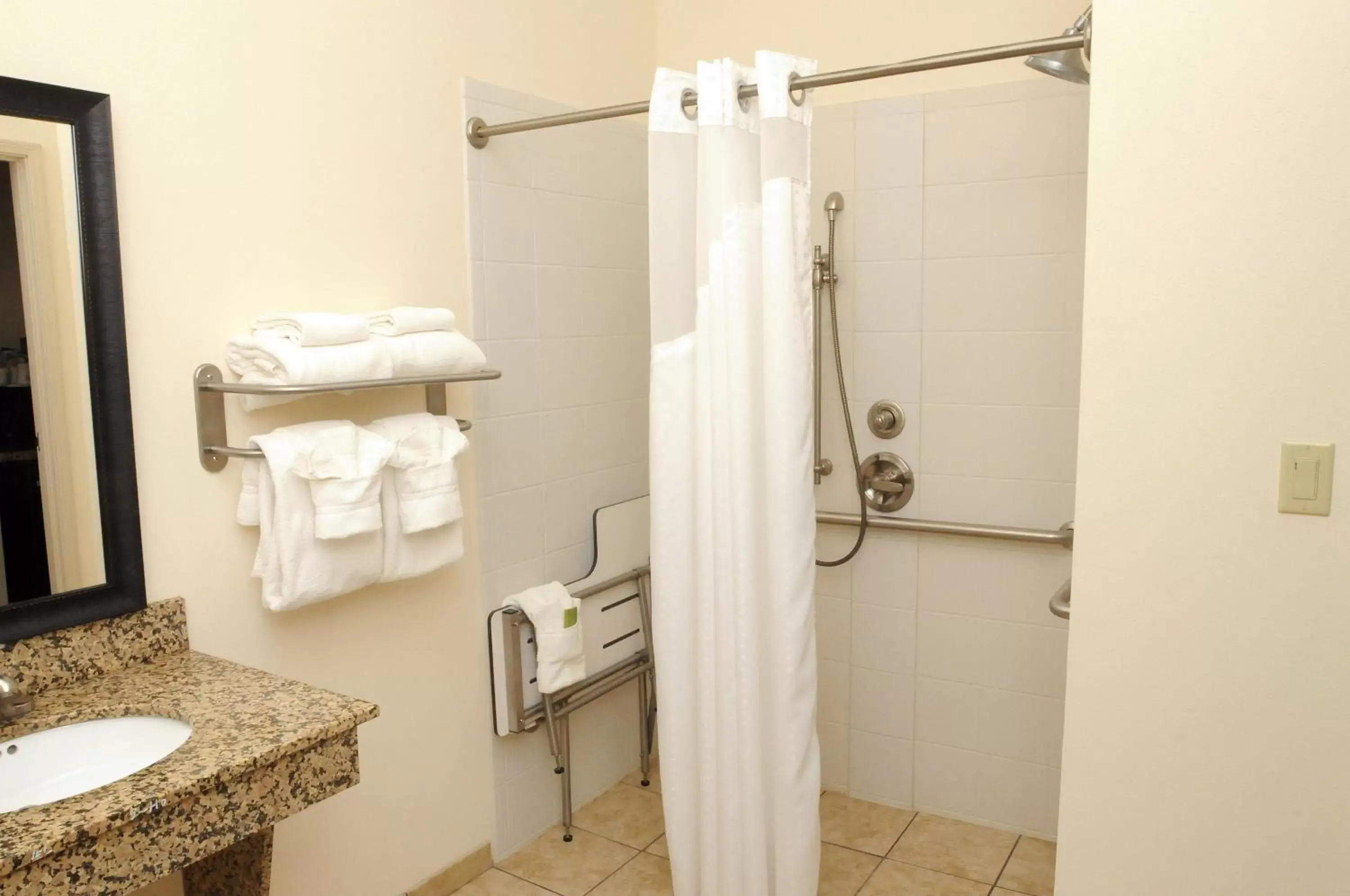 Bathroom in Holiday Inn Express & Suites Cambridge, an IHG Hotel