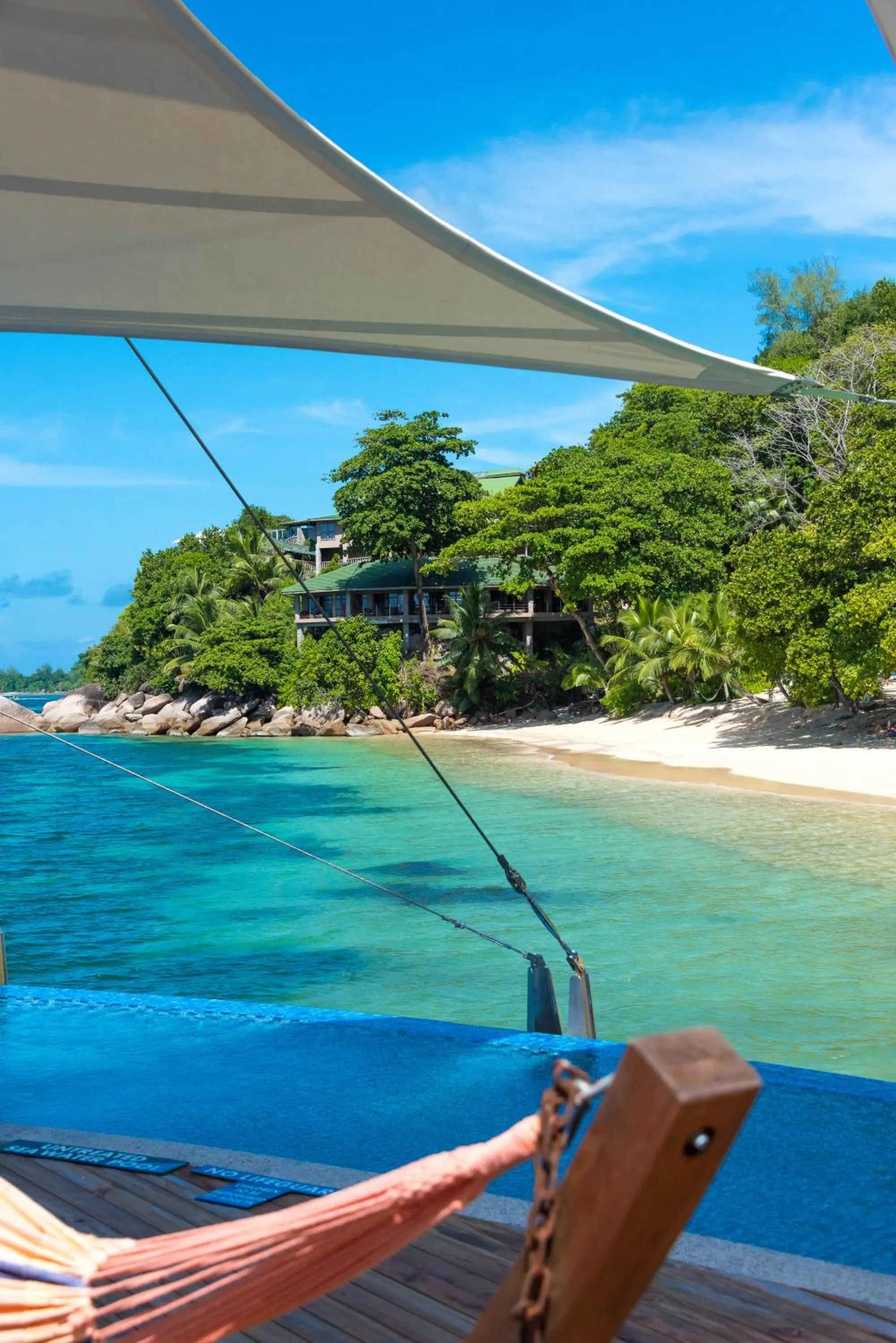 Beach in Coco de Mer Hotel and Black Parrot Suites