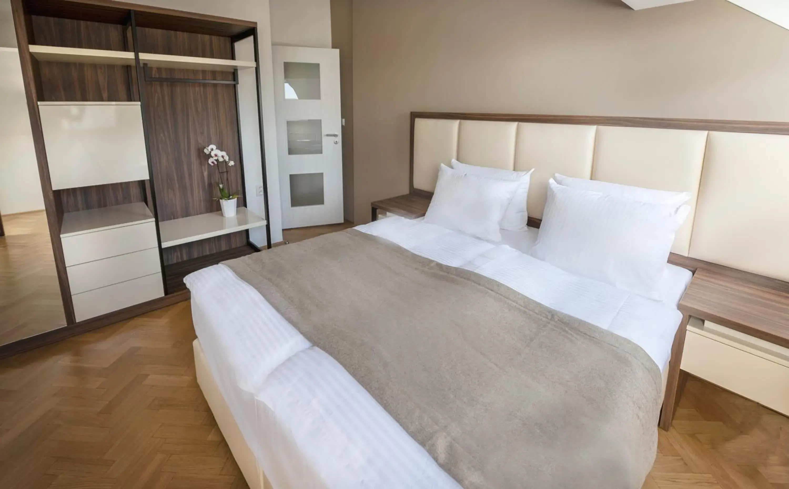 Bed in Letna Garden Suites