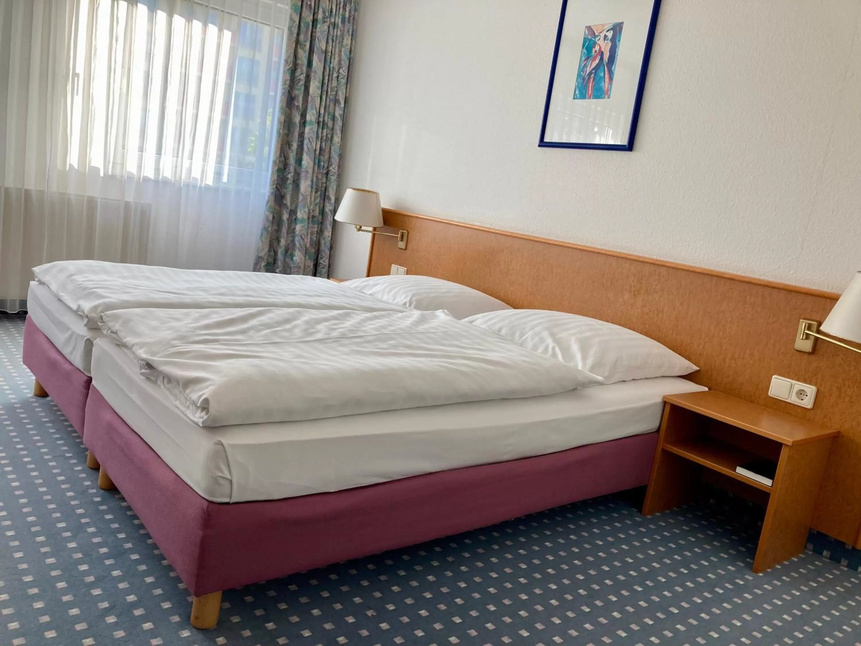 Bed in Akzent Congresshotel Hoyerswerda