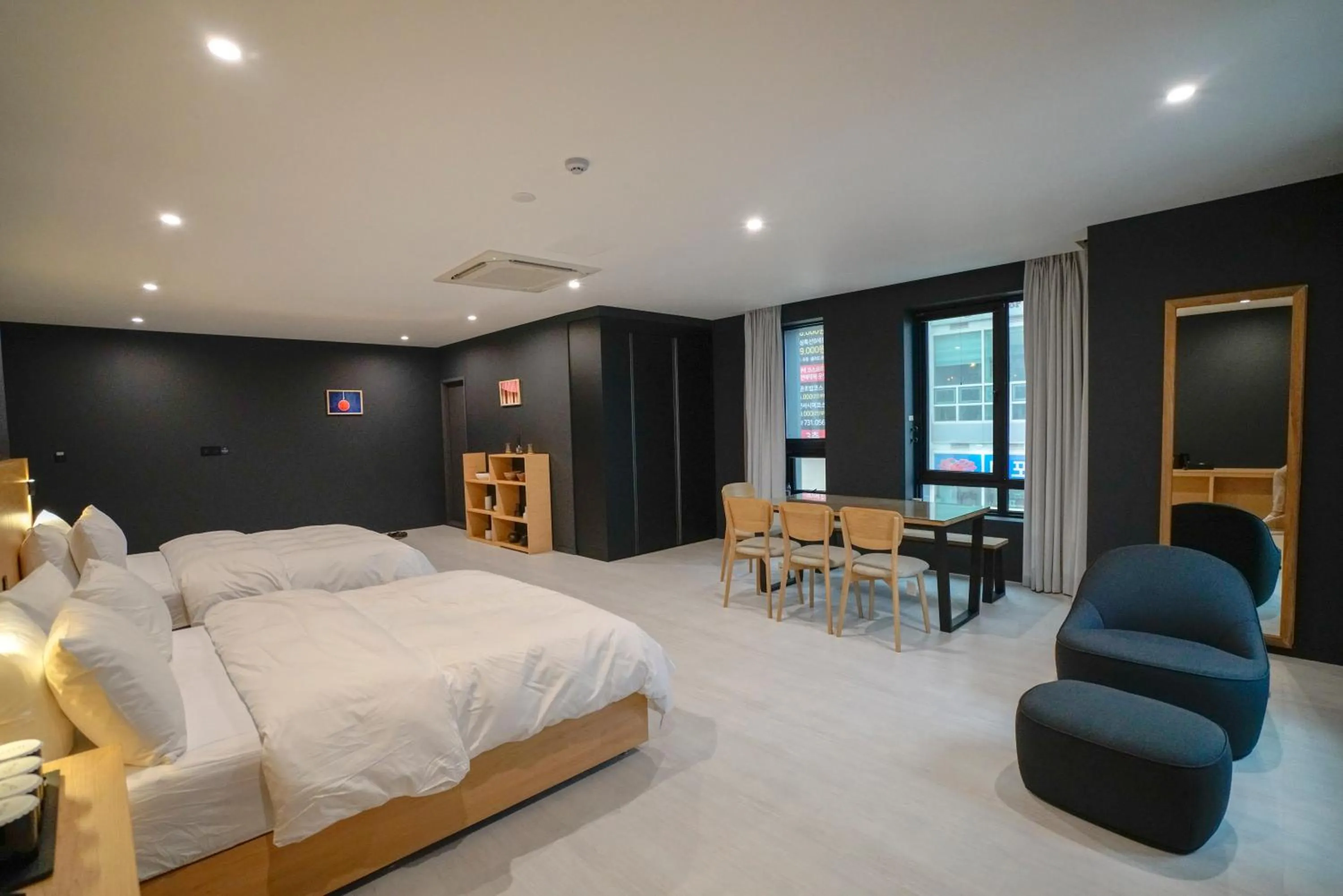 Bed in Mipo Oceanside Hotel