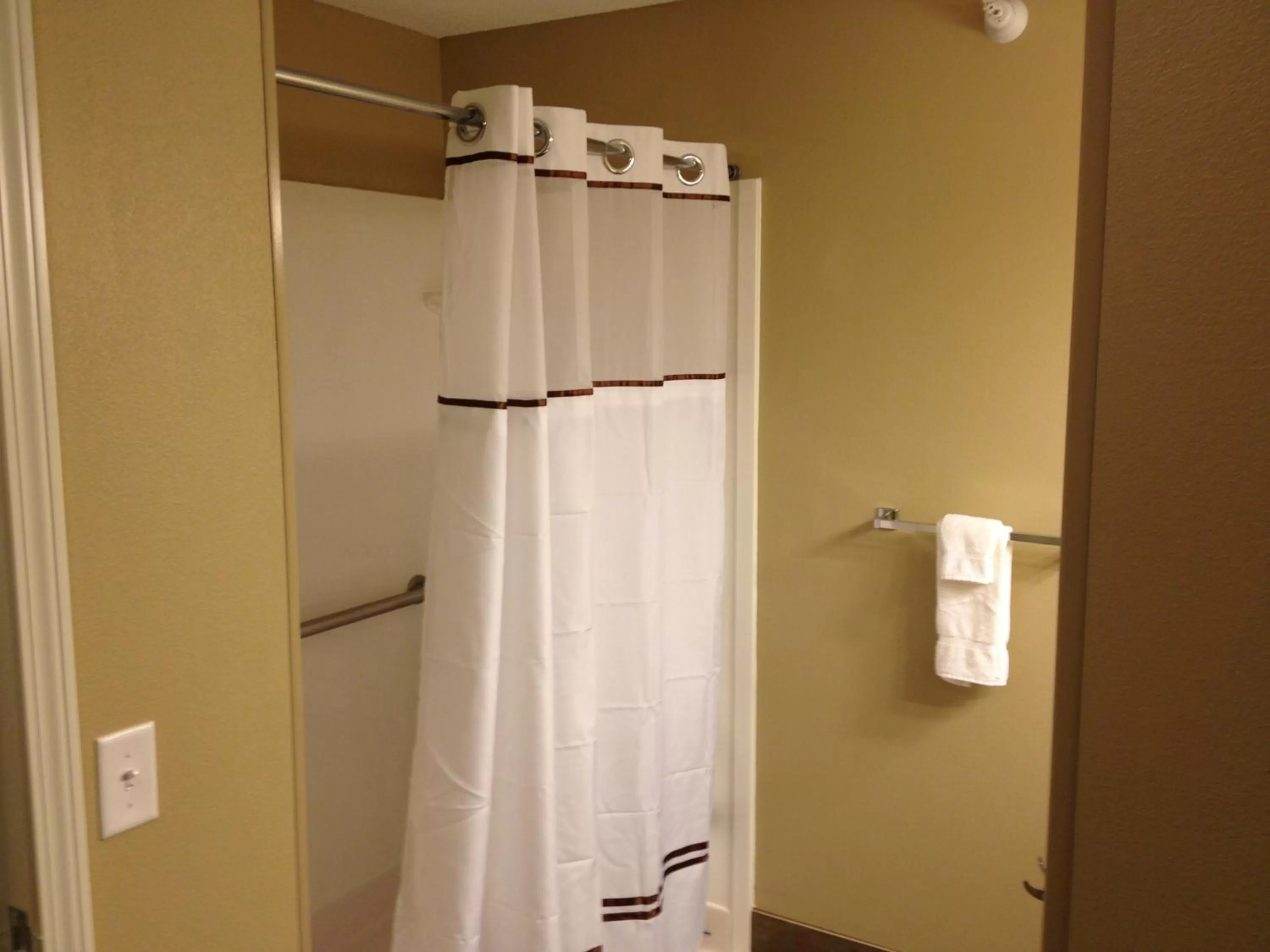 Shower in GrandStay Hotel & Suites - Glenwood