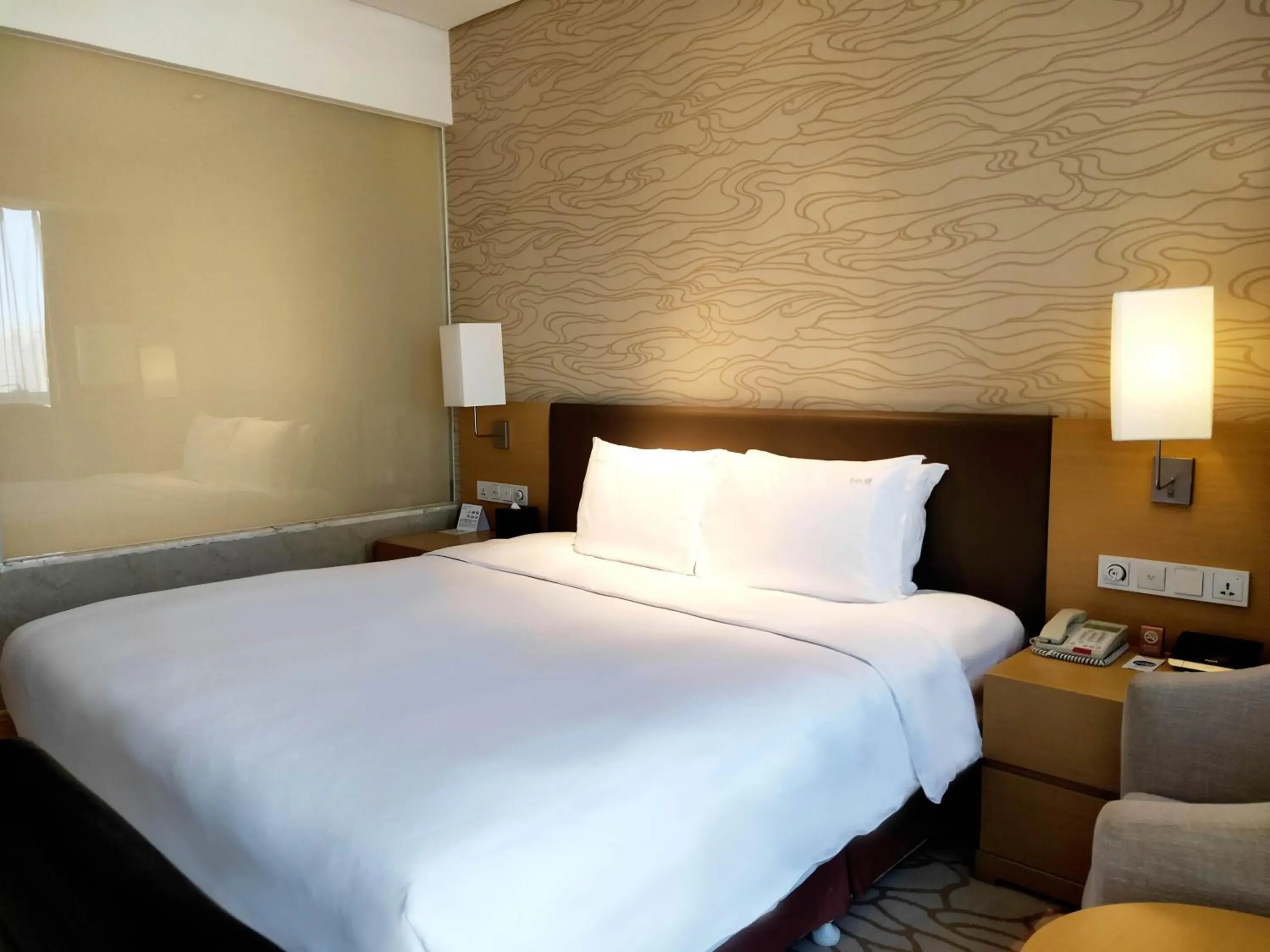 Bed in Radisson Hotel Tianjin Aqua City