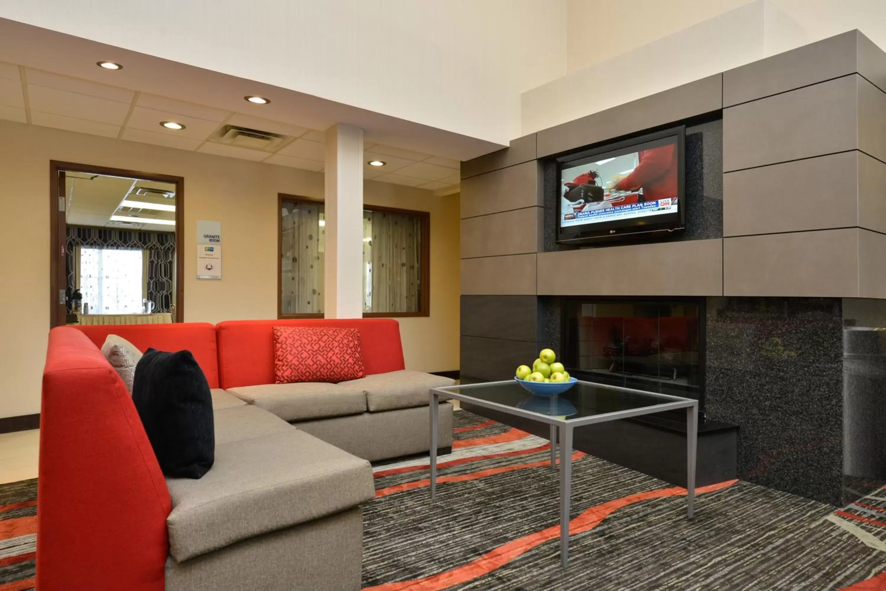 Communal lounge/ TV room, Seating Area in Holiday Inn Express Boston/Milford Hotel, an IHG Hotel