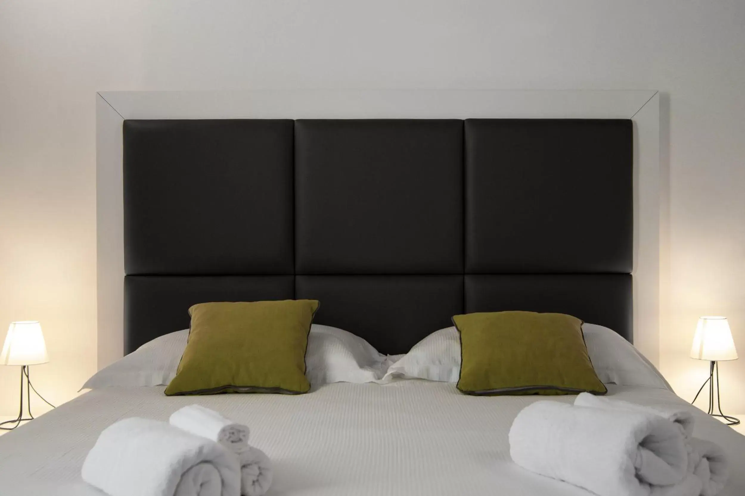 Bed in Interamnia Boutique Hotel