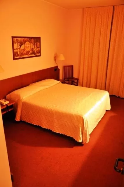 Bed in Albergo Ponte Vecchio