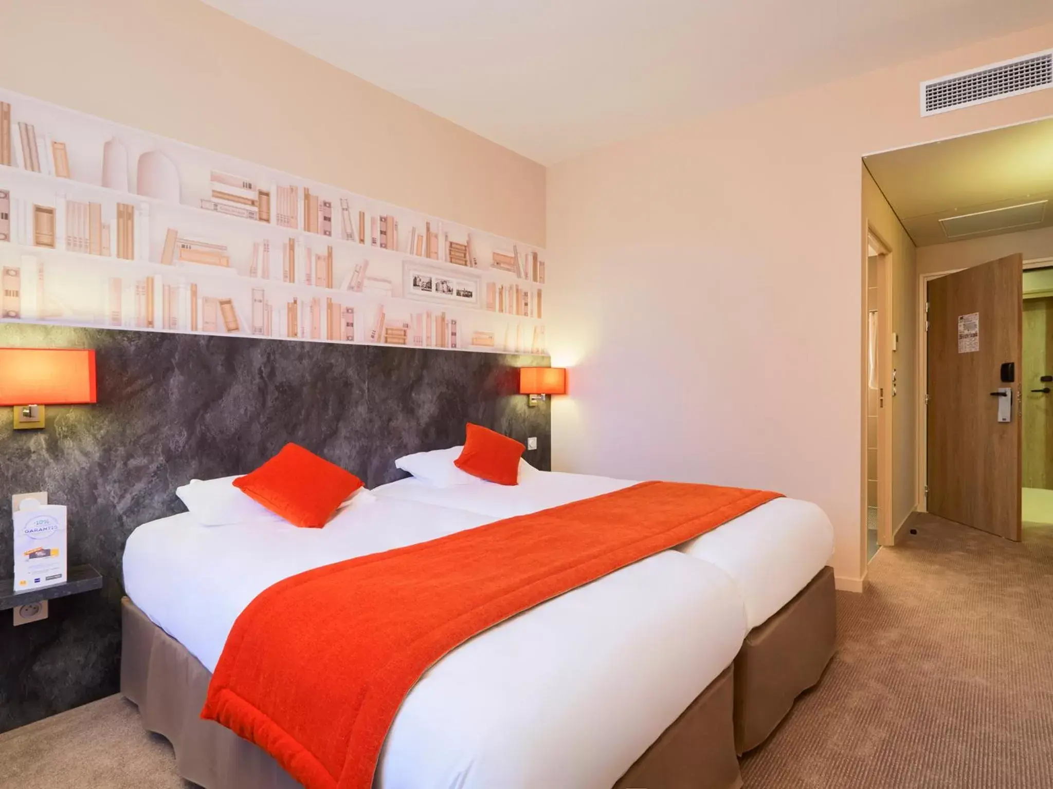 Bed in Kyriad Angers Ouest Beaucouzé Bed in Kyriad Angers Ouest Beaucouzé