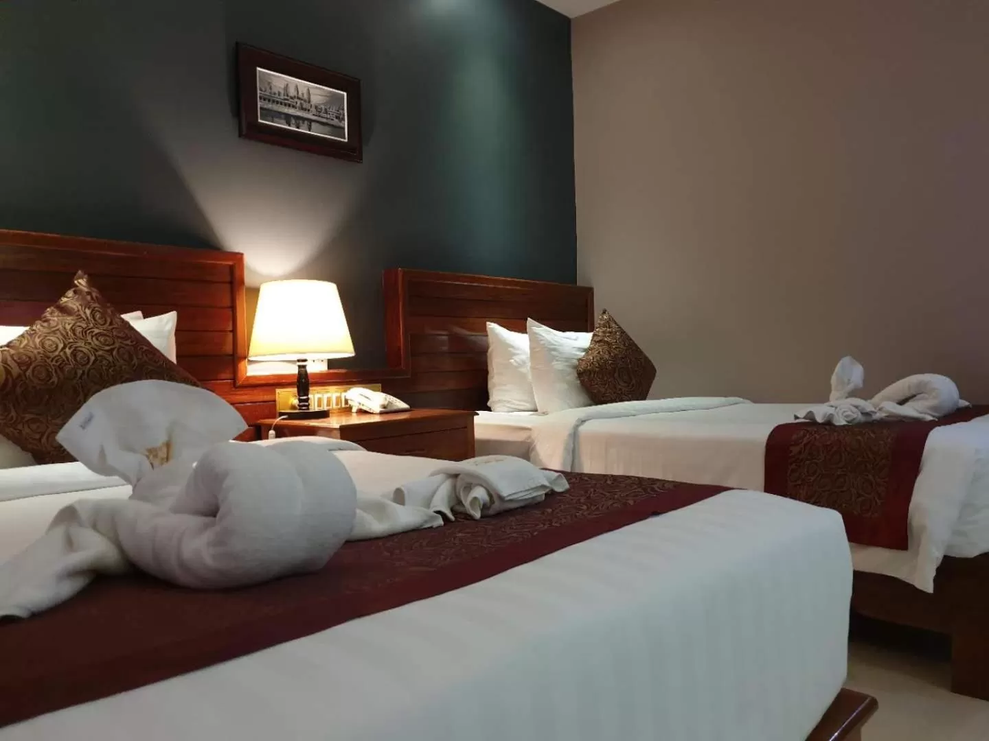 Bed in Aristocrat Residence & Hotel