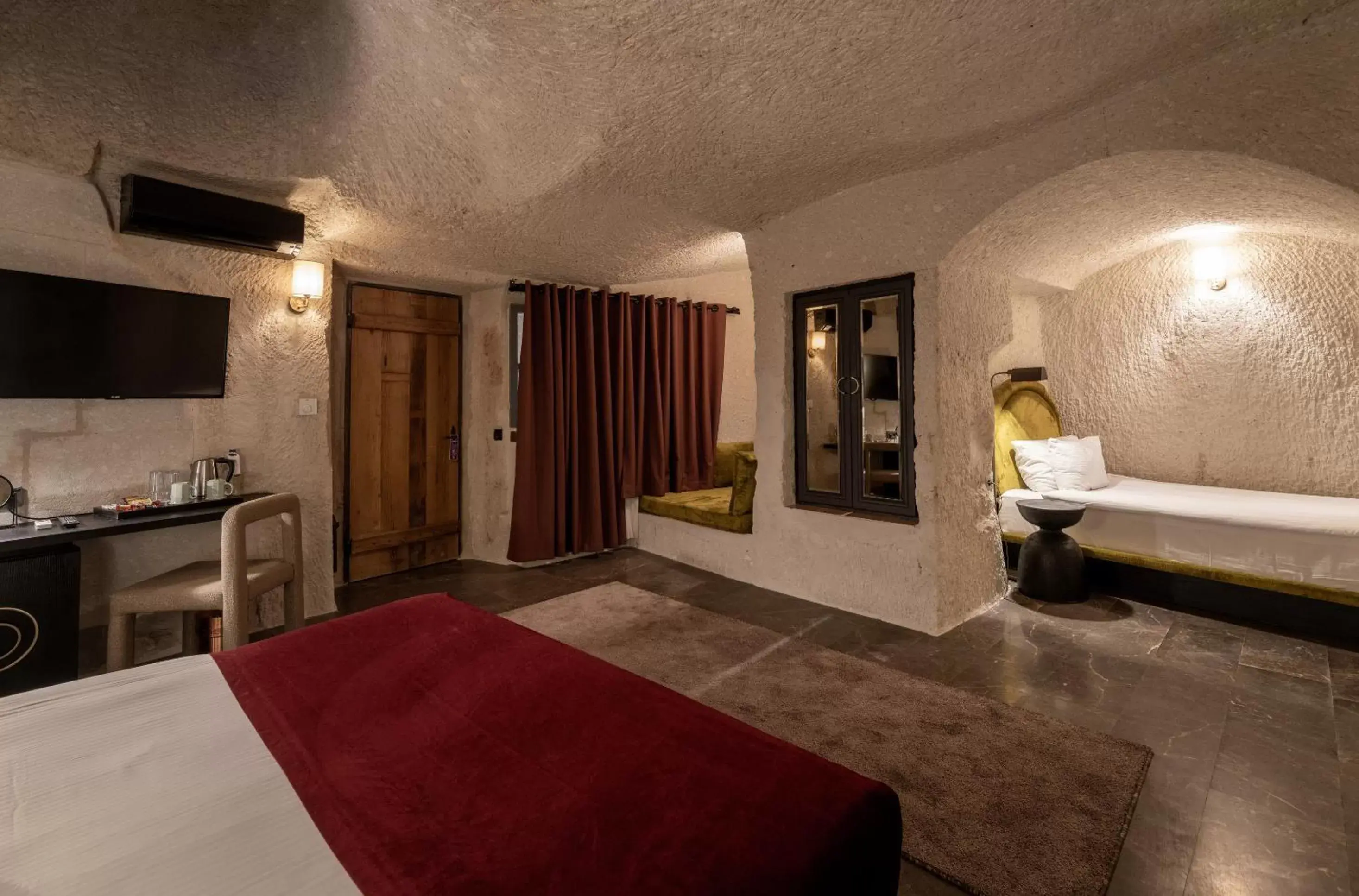 Bedroom in Artemis Cave Suites & Spa- Adults Only