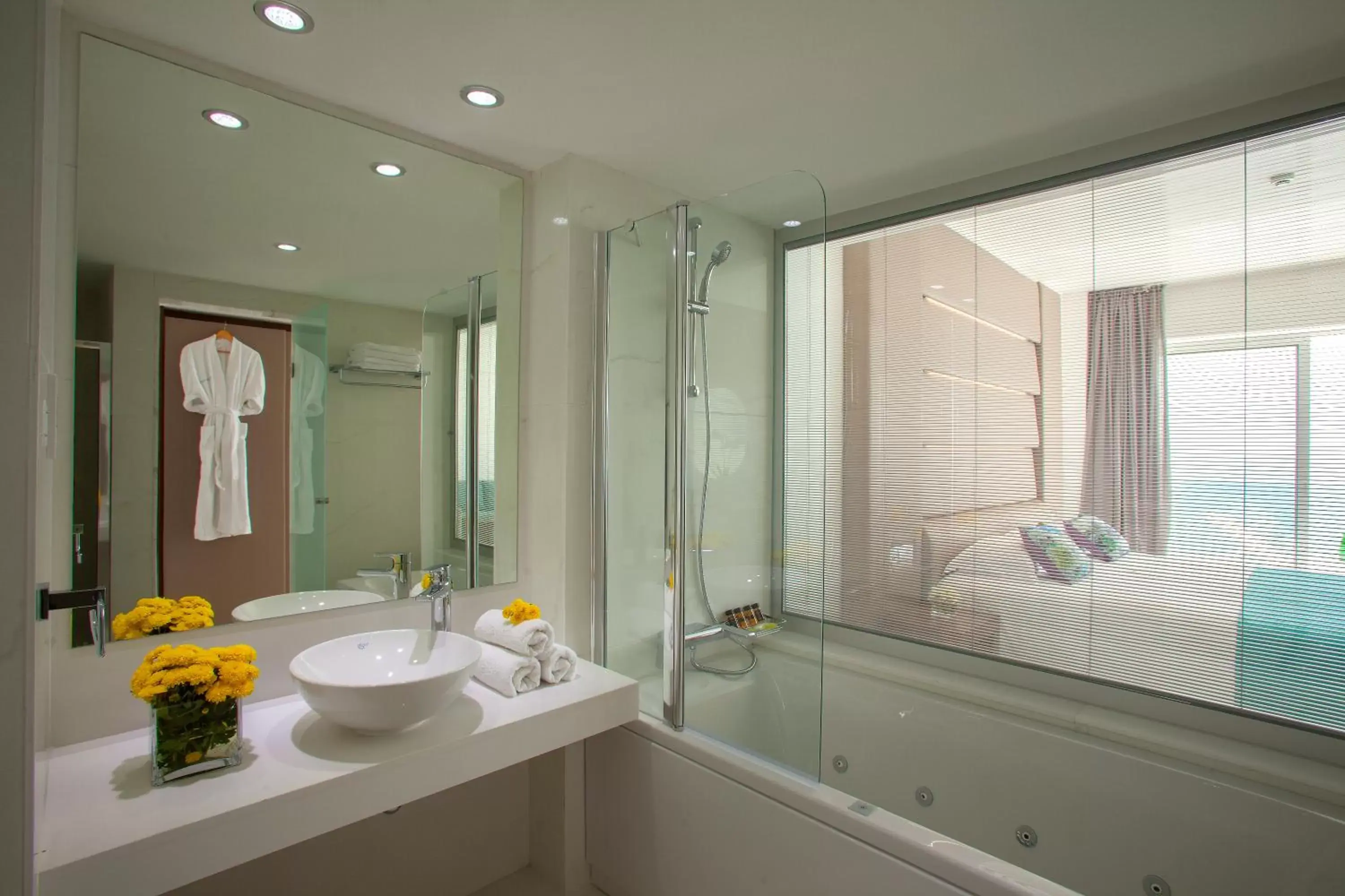 Bathroom in King Evelthon Beach Hotel & Resort