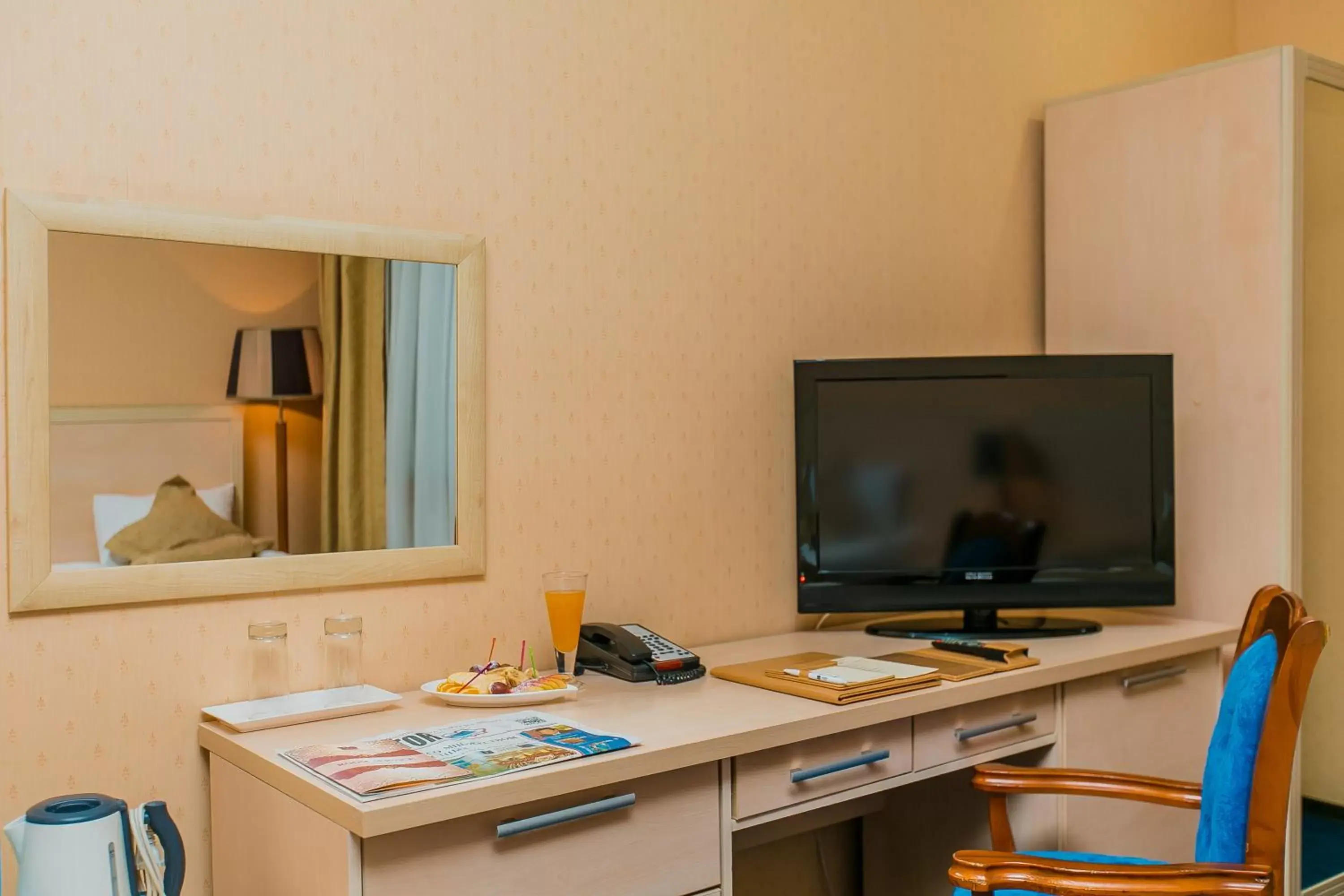 TV and multimedia, TV/Entertainment Center in King Hotel Astana