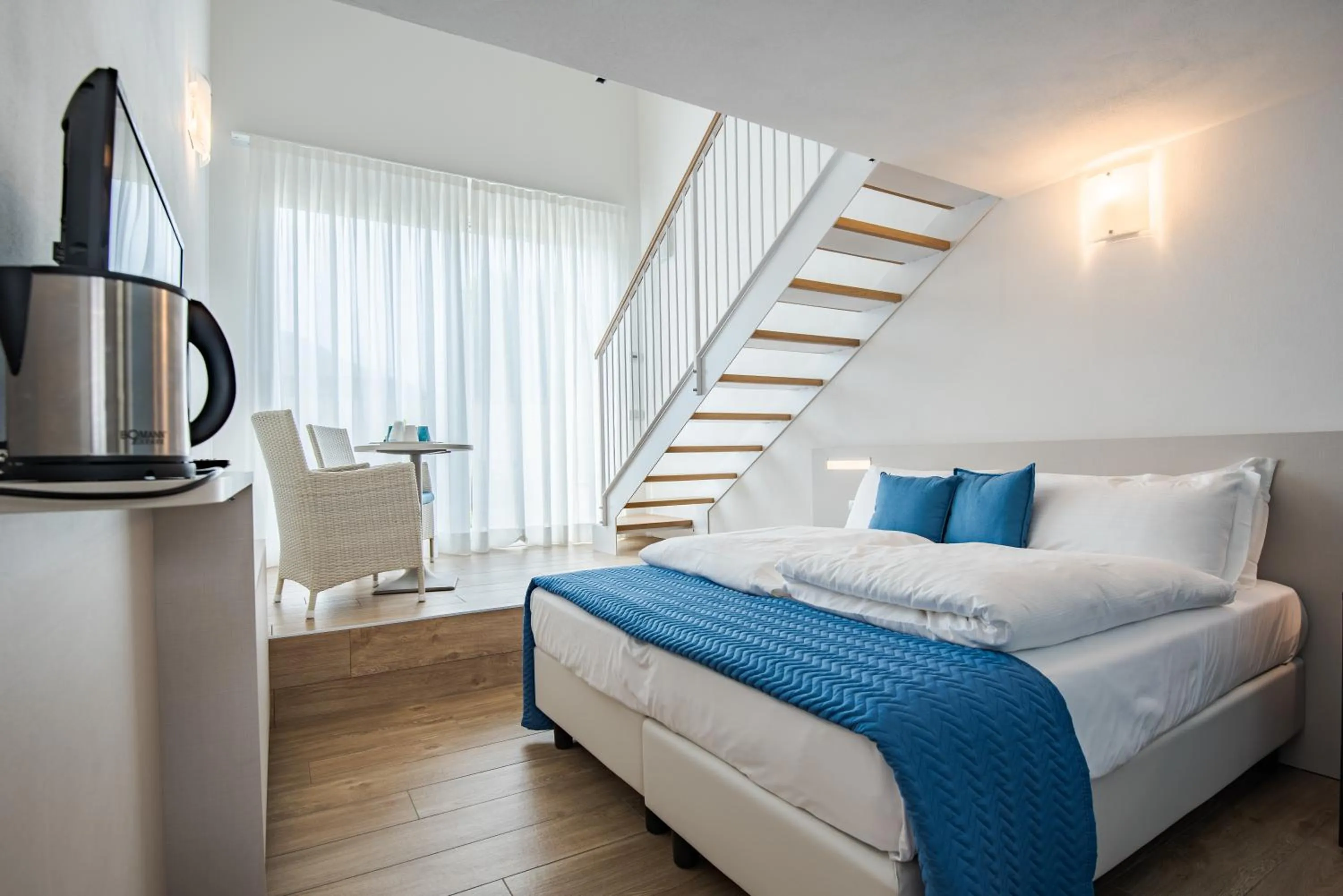 Living room, Bed in Hotel Vischi