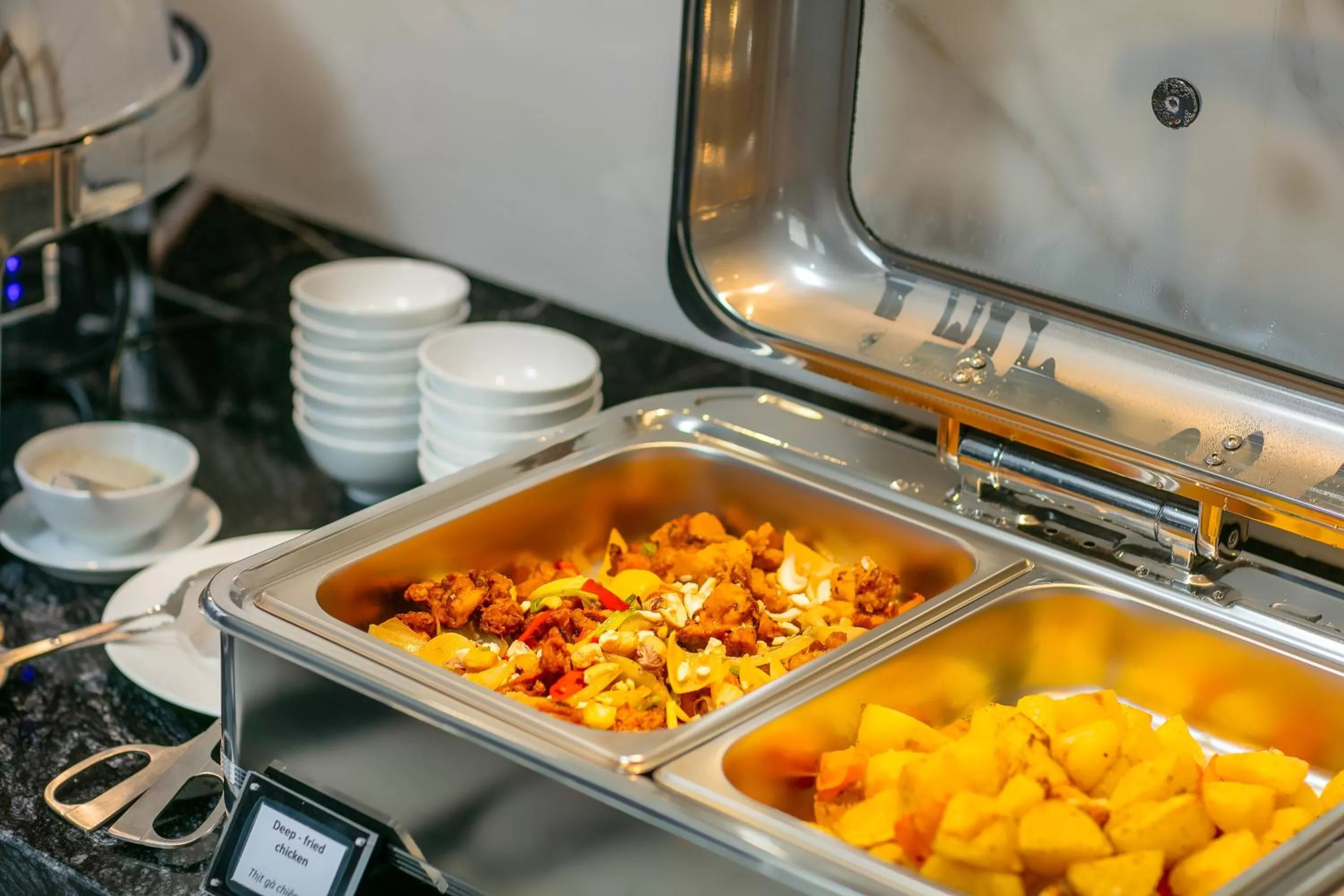 Buffet breakfast in MAY DE VILLE Lakeside Hotel