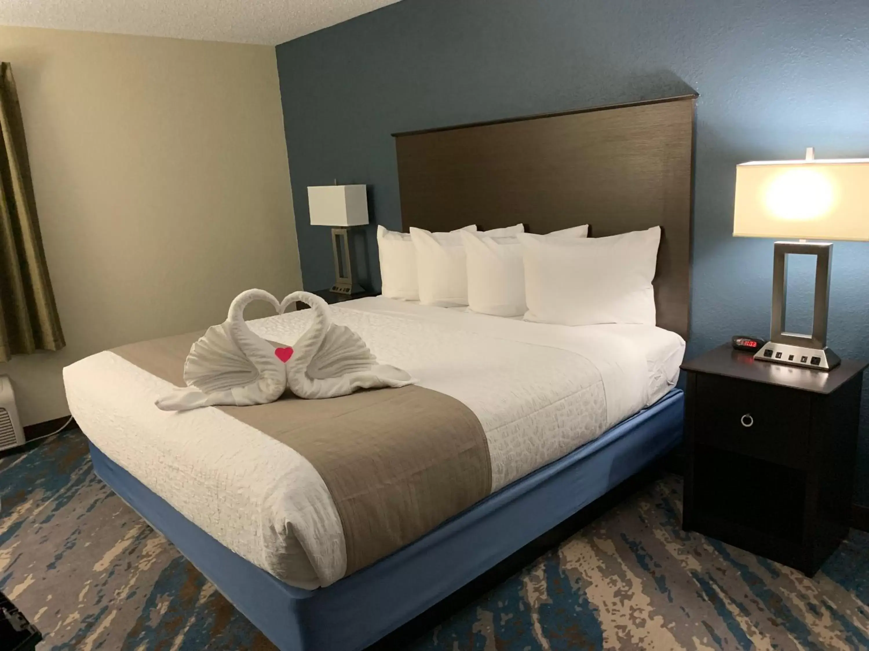 Bed in AmericInn by Wyndham Prairie du Chien