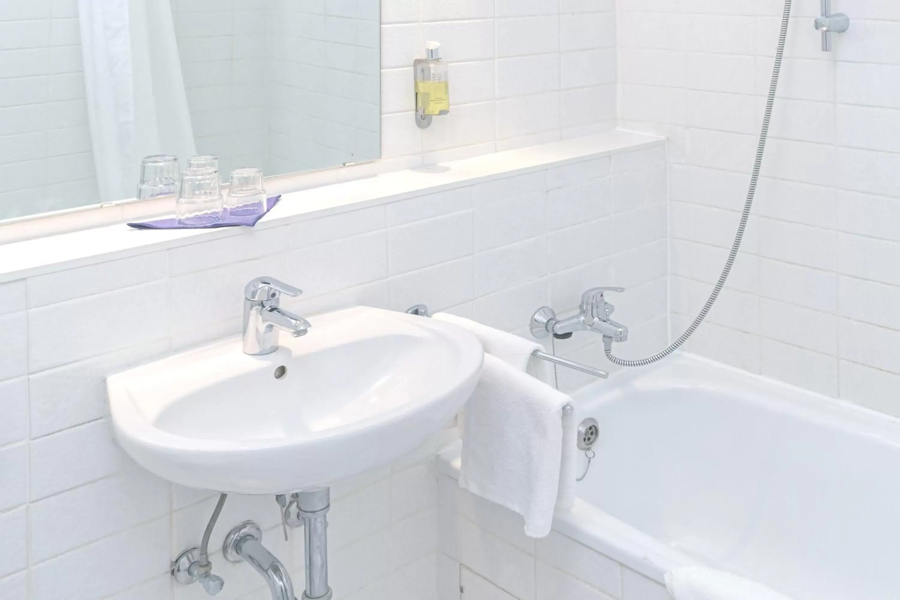 Bathroom in Hotel Plöner See by Tulip Inn