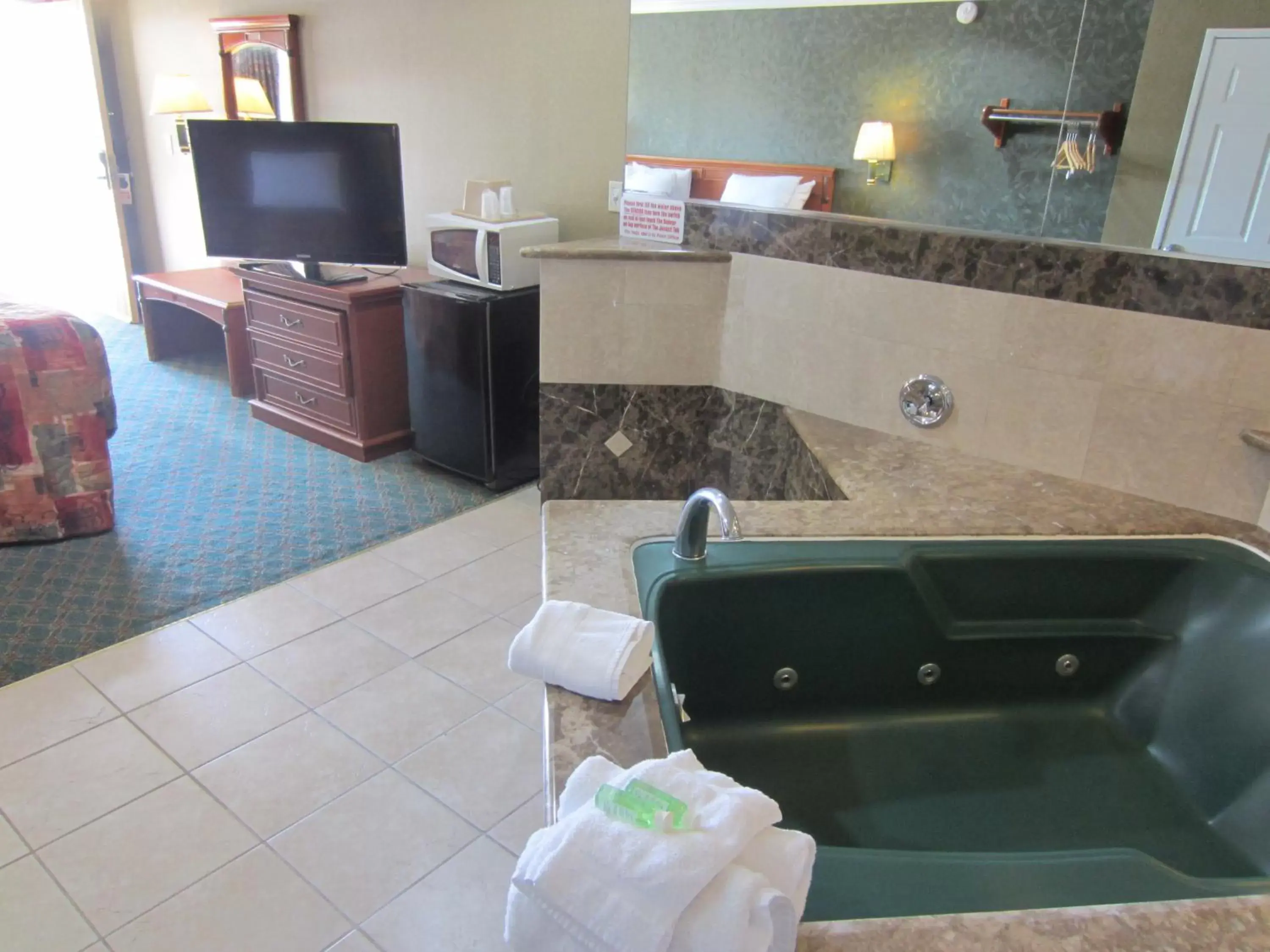 Photo of the whole room, Bathroom in Crystal Inn Suites & Spas