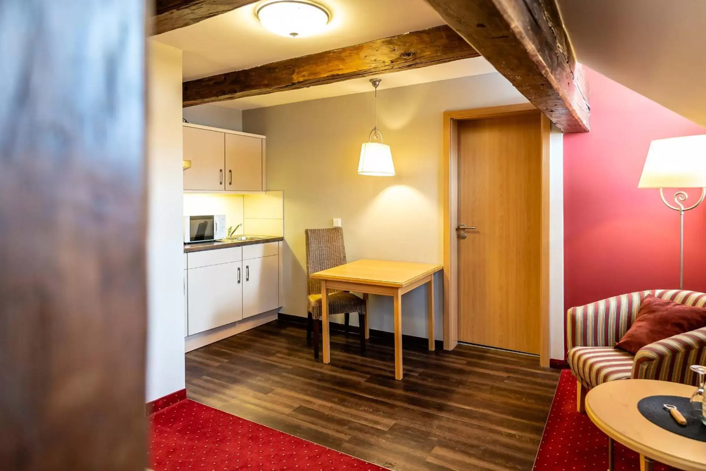 Kitchen or kitchenette, Seating Area in Hotel Vollmann