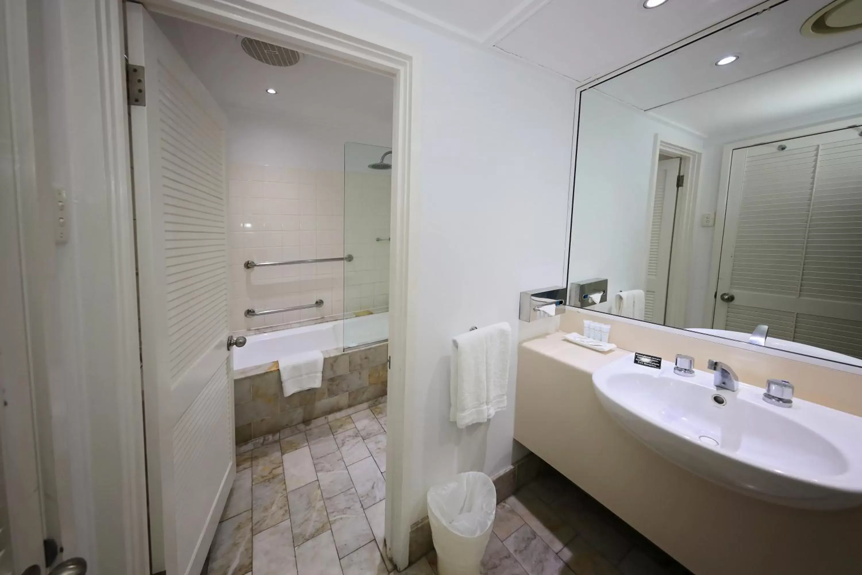 Bathroom in Ramada By Wyndham Cairns City Centre