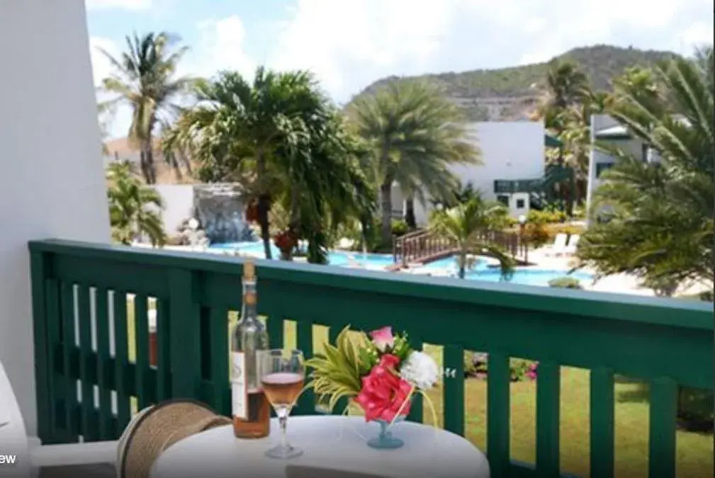Balcony/Terrace, Pool View in Sugar Bay Club