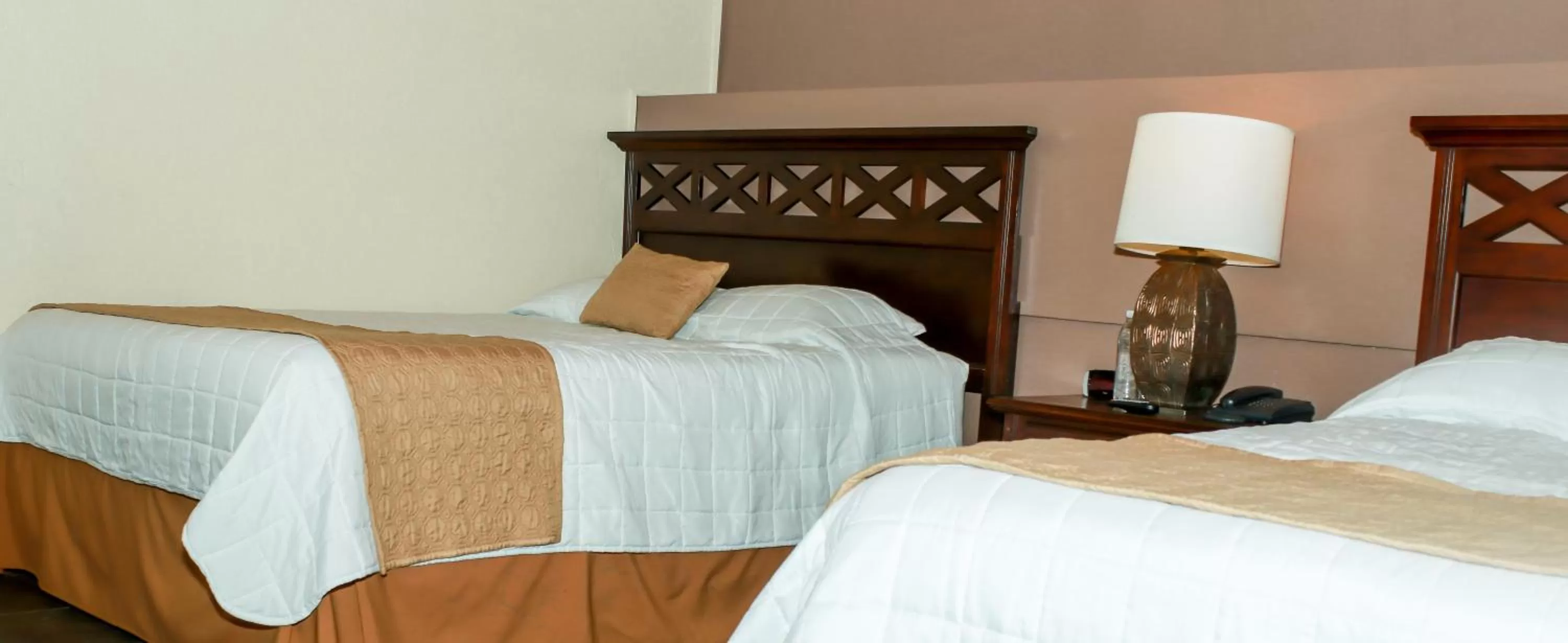 Bed in Las Magnolias Hotel Boutique